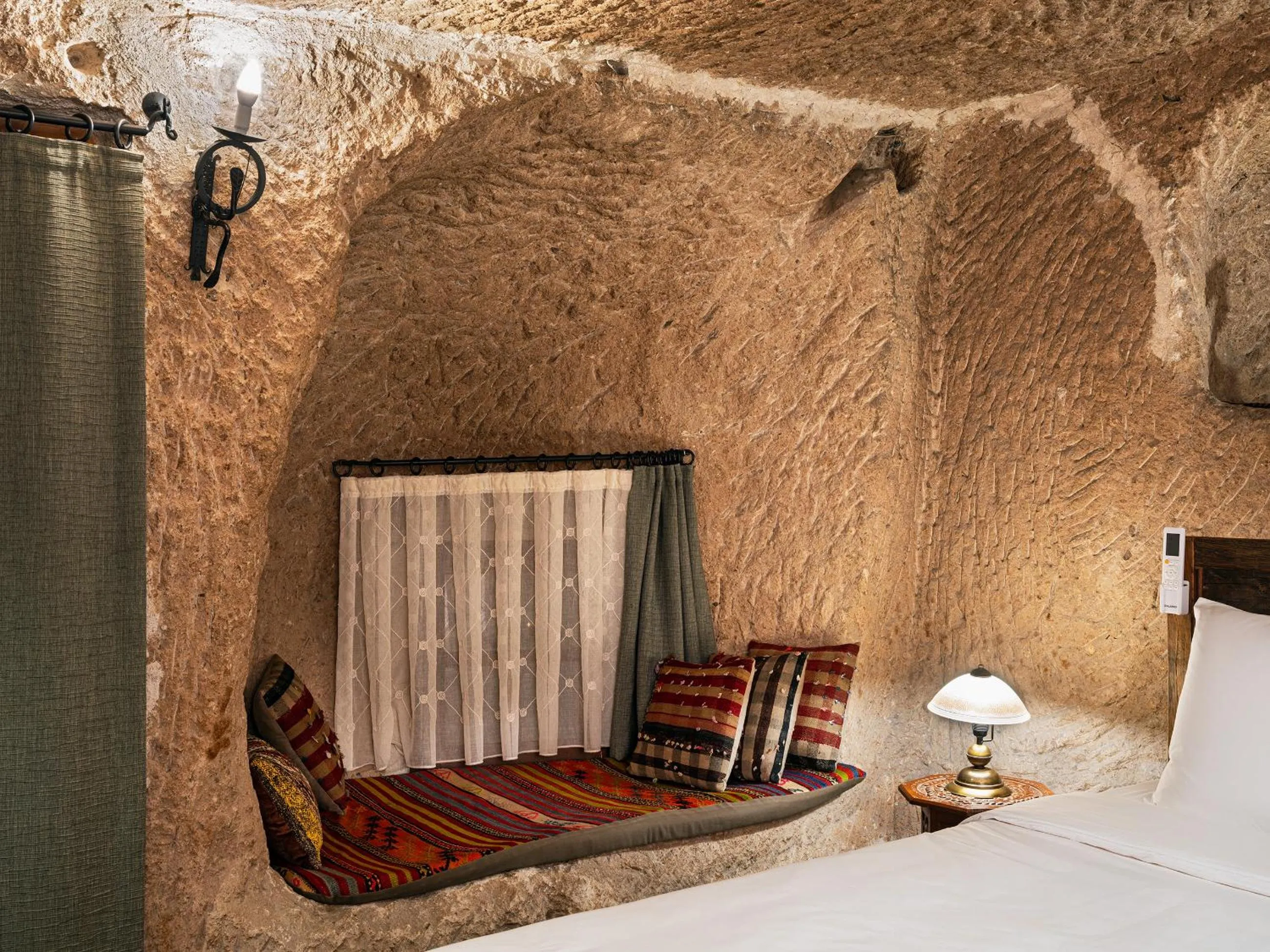 Living room, Bed in Kelebek Cave Hotel