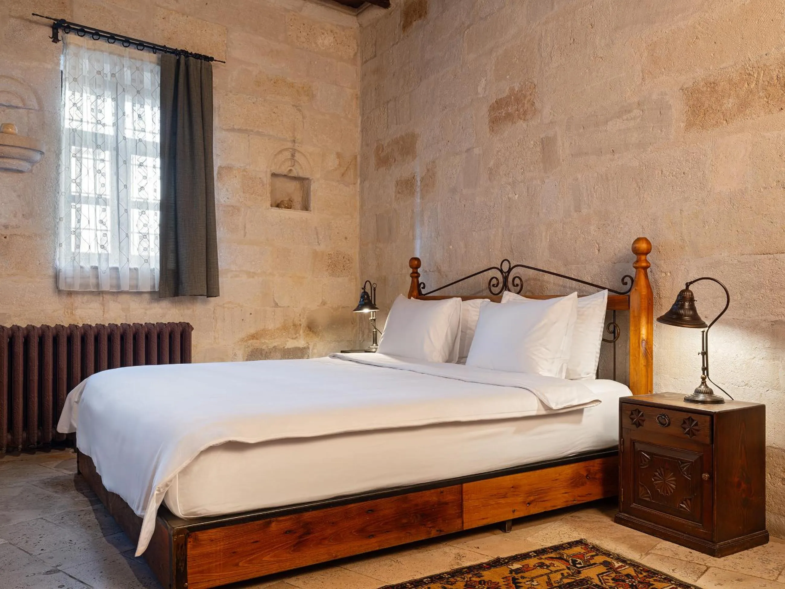 Bed in Kelebek Cave Hotel