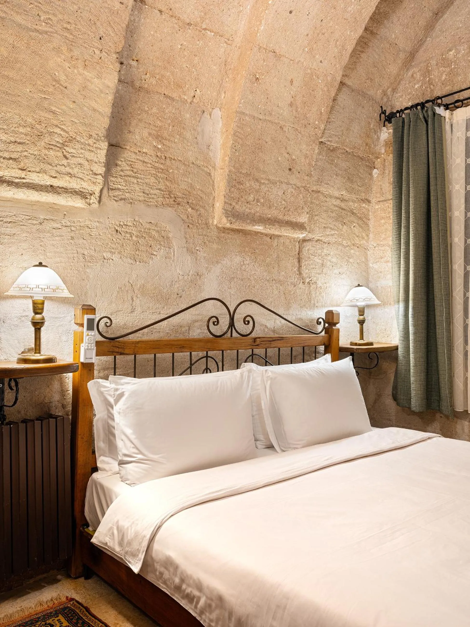 Bed in Kelebek Cave Hotel