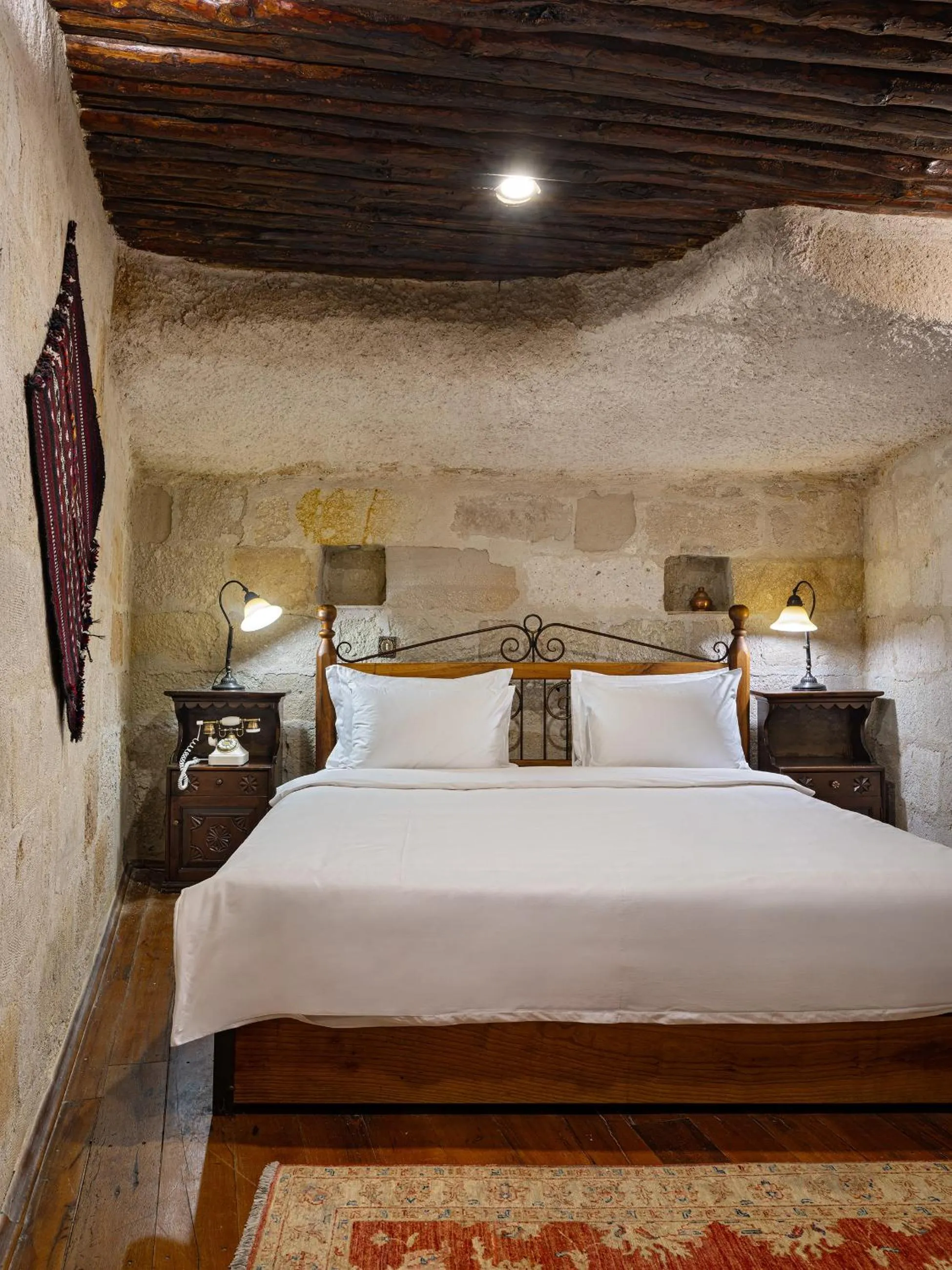 Bed in Kelebek Cave Hotel