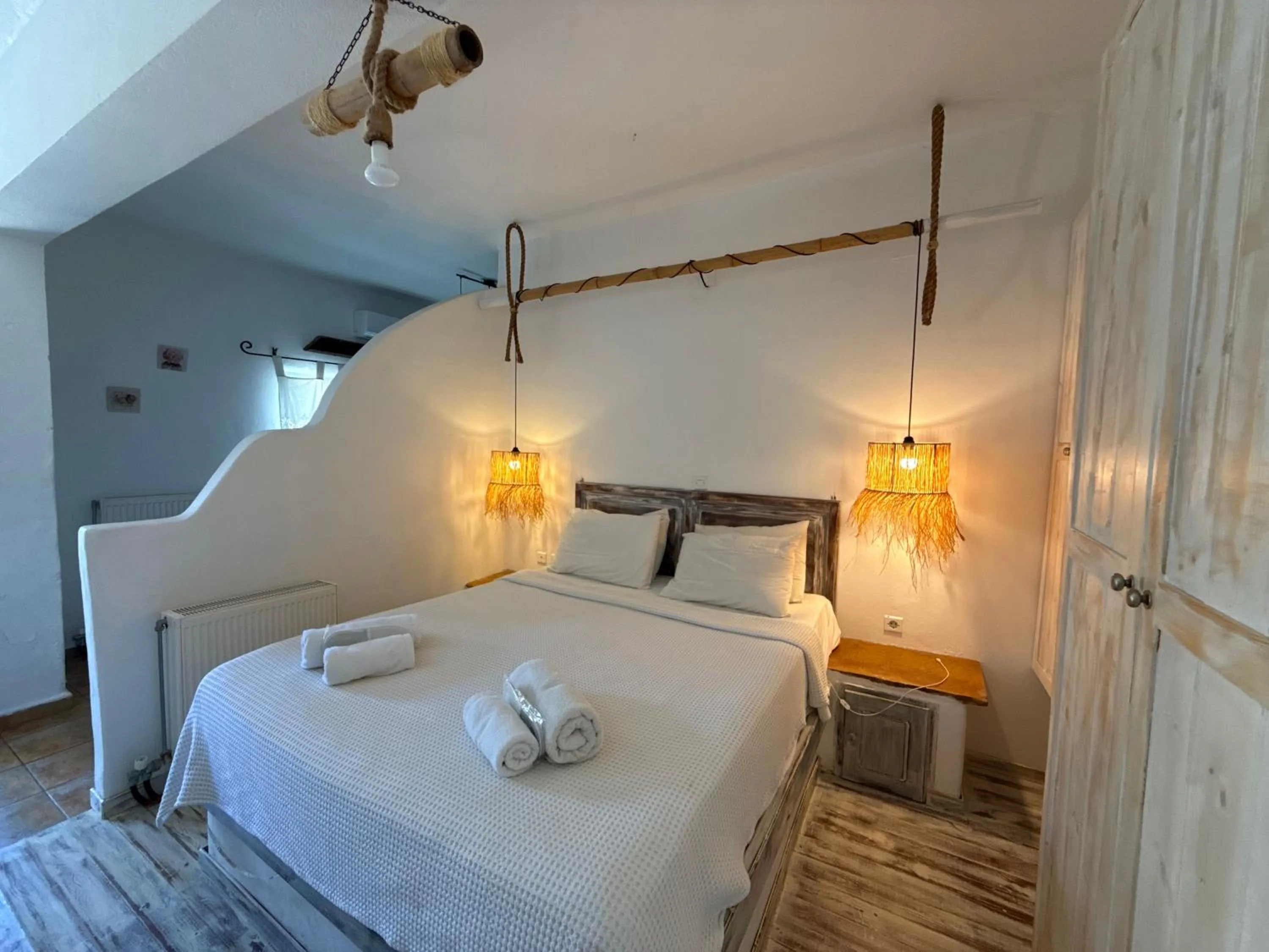 Bed in Atlazia Suites