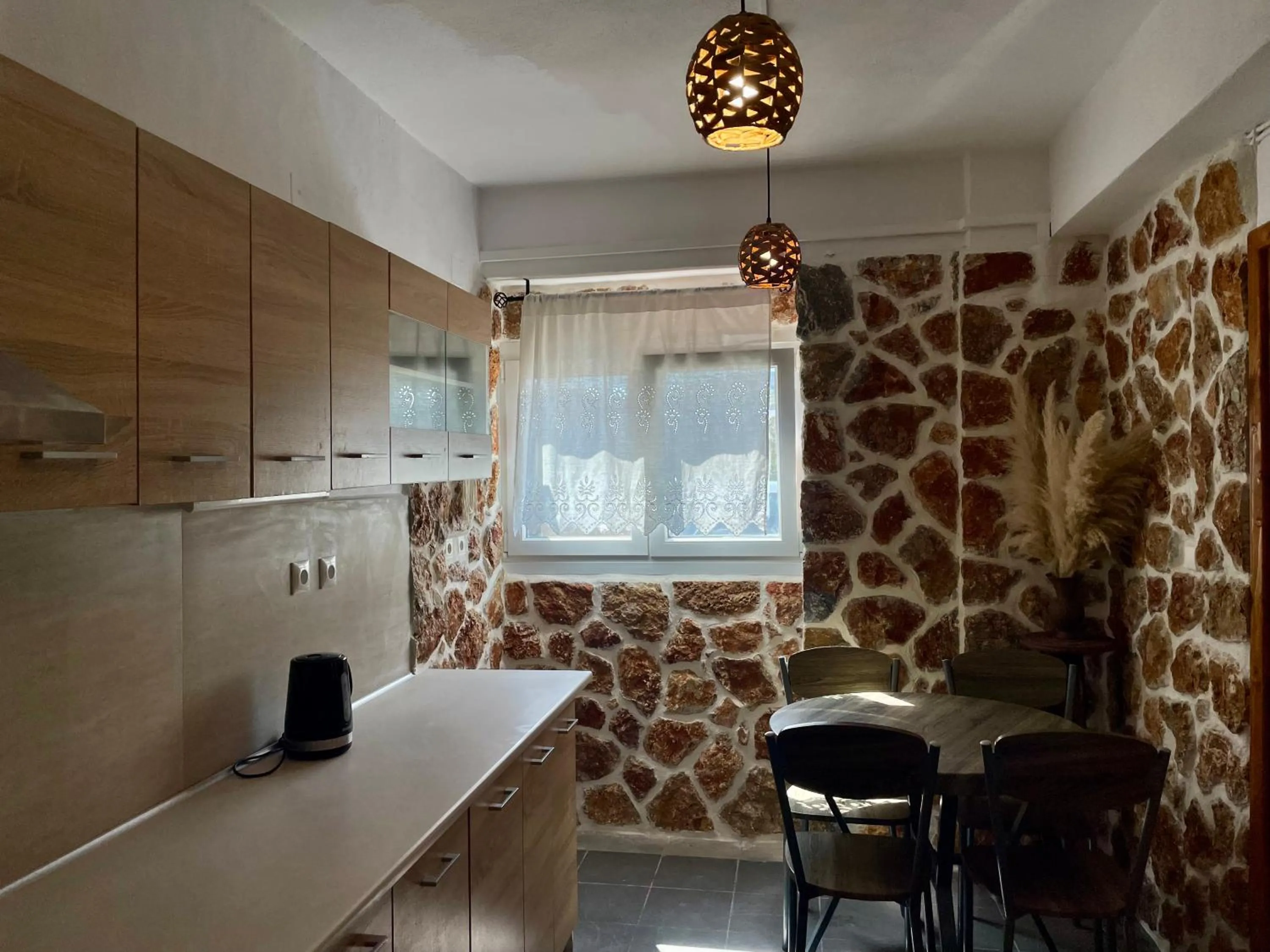 Kitchen or kitchenette in Atlazia Suites