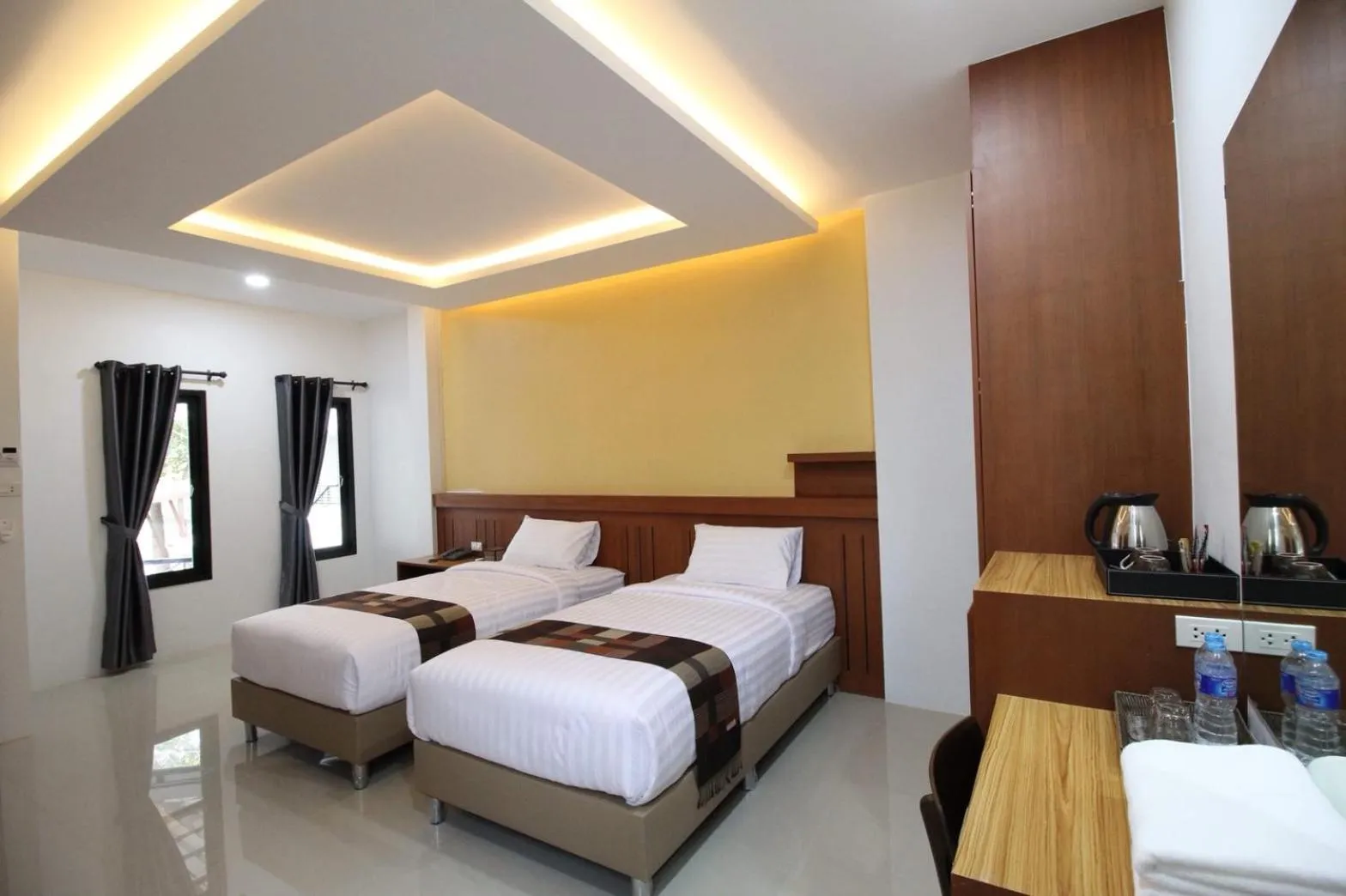 Bed in Nonghan Grand Hotel and Resort