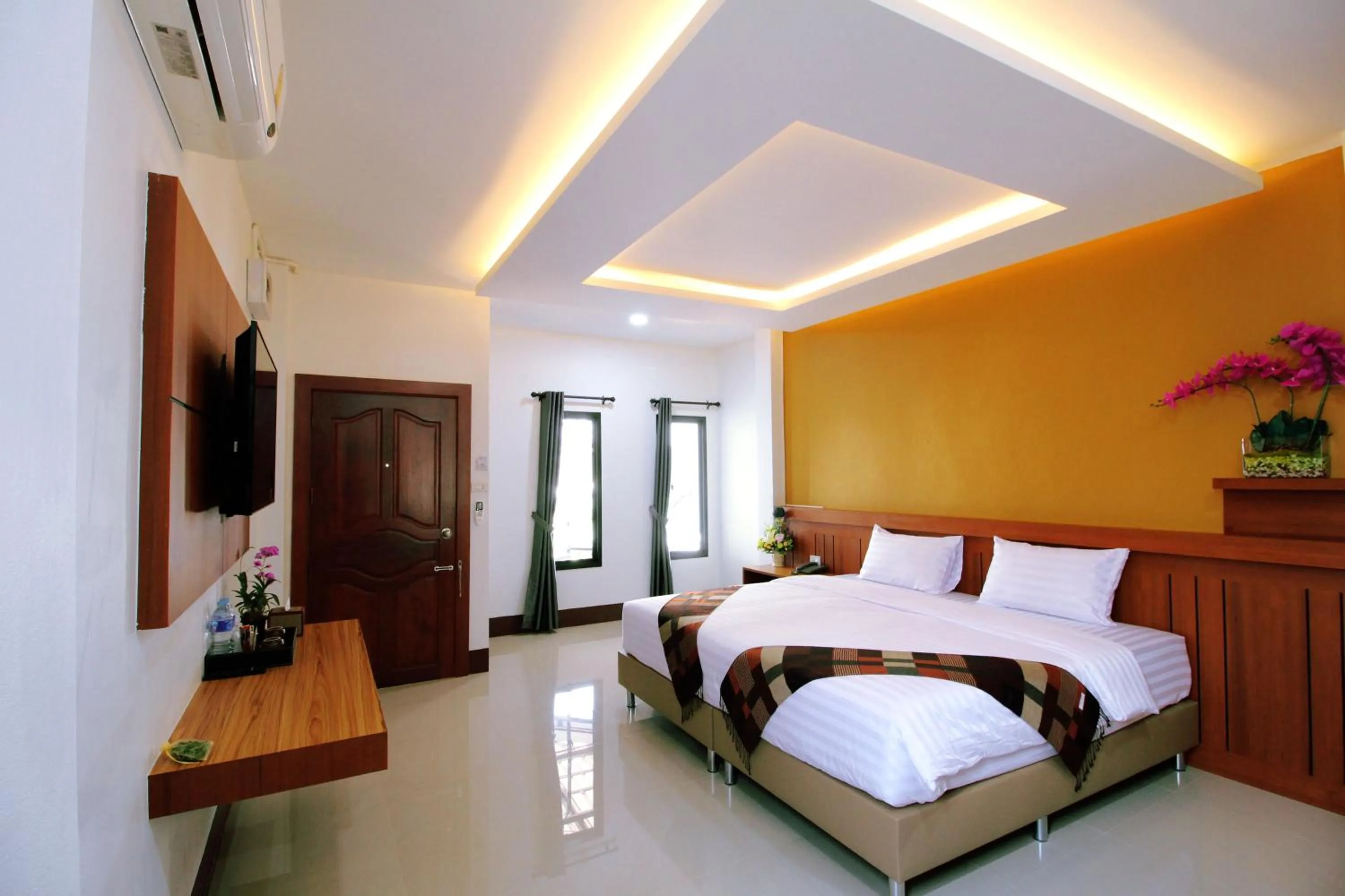 Bed in Nonghan Grand Hotel and Resort