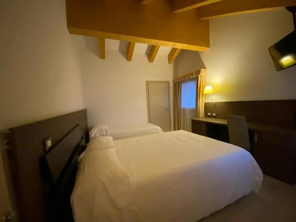 Bed in Grand Hotel Miramonti