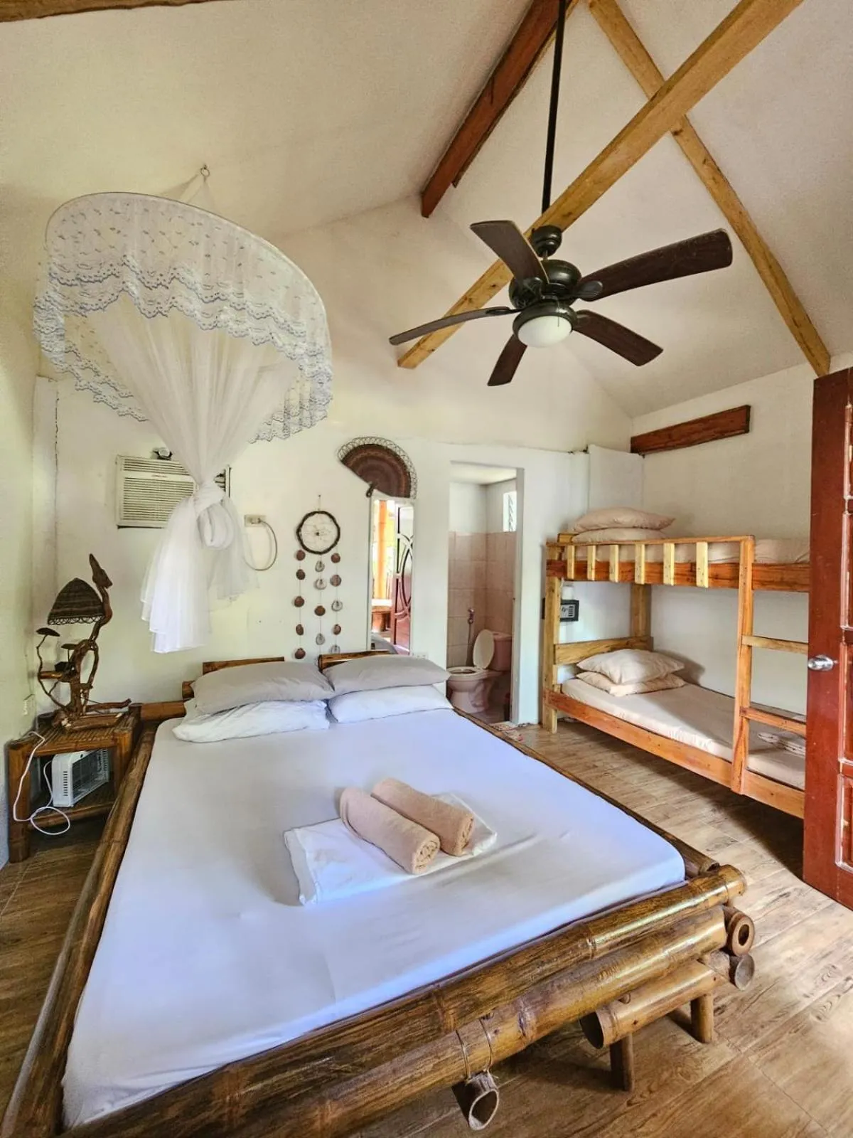 Bed in Big BamBoo Beach Resort Sipalay