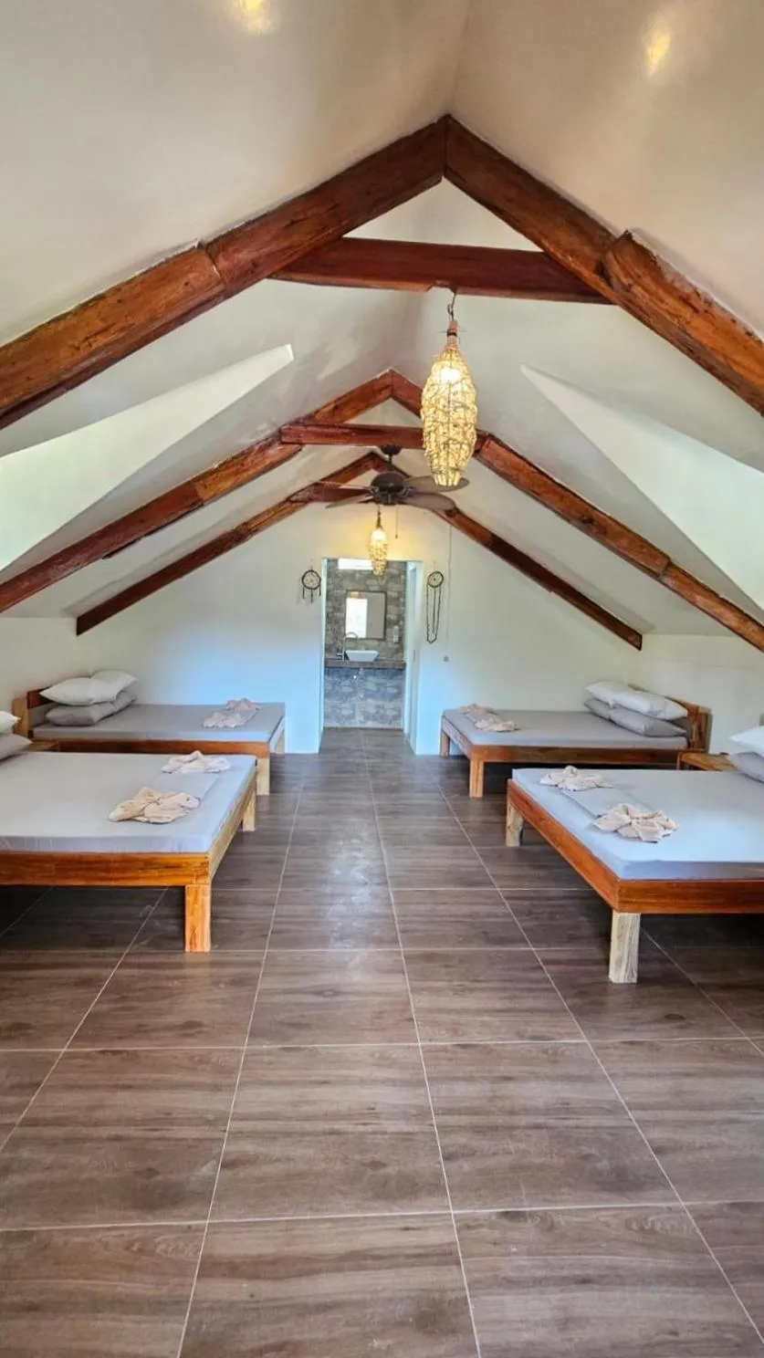 Bed in Big BamBoo Beach Resort Sipalay