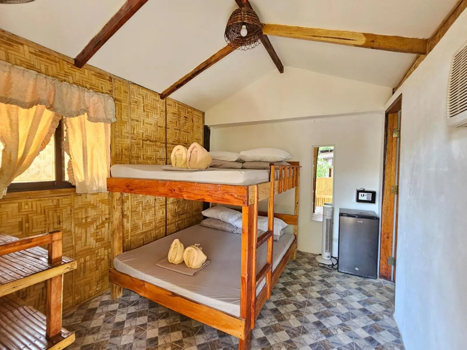 Bed in Big BamBoo Beach Resort Sipalay