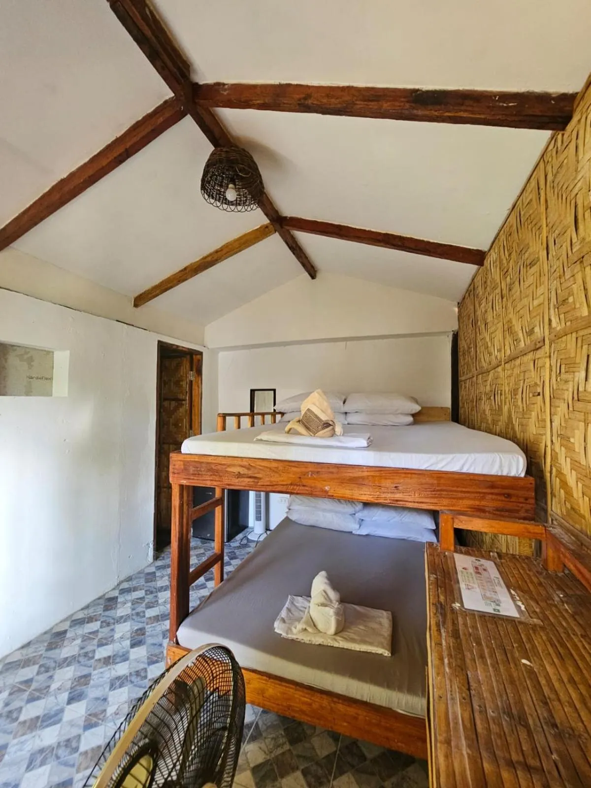 Bed in Big BamBoo Beach Resort Sipalay