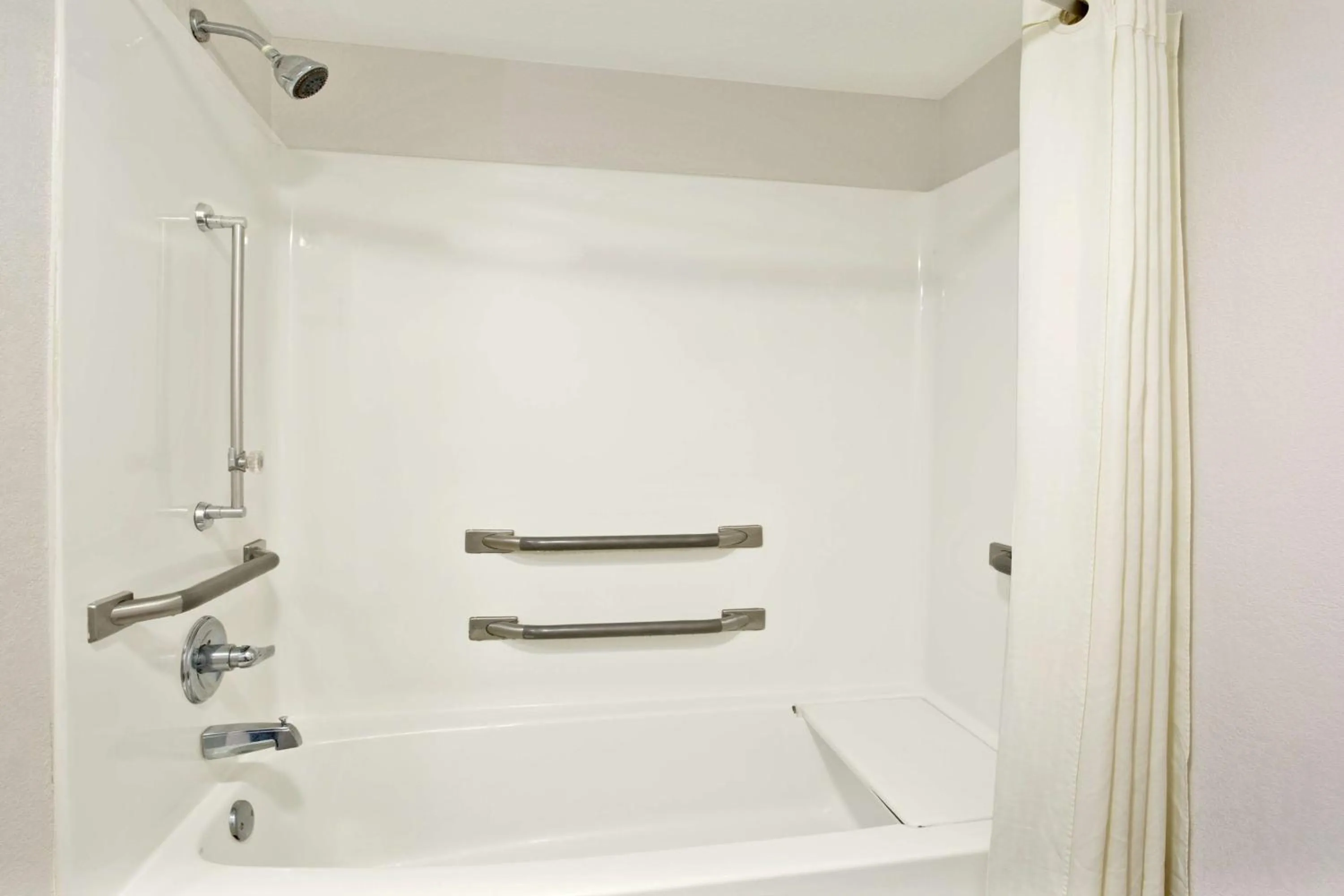 Bathroom in Super 8 by Wyndham Gainesville