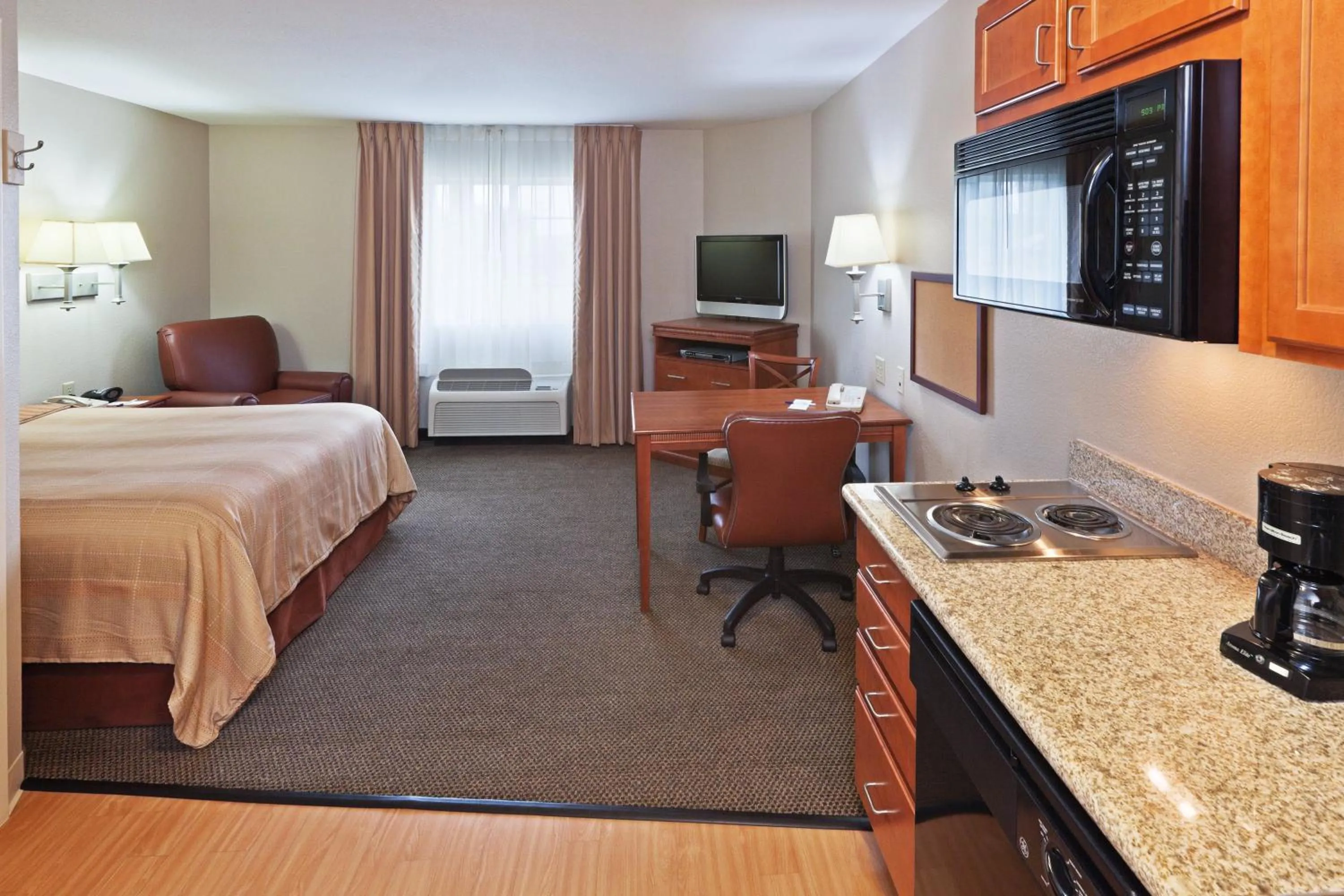 Photo of the whole room, Bed in Candlewood Suites Wichita Falls at Maurine Street by IHG