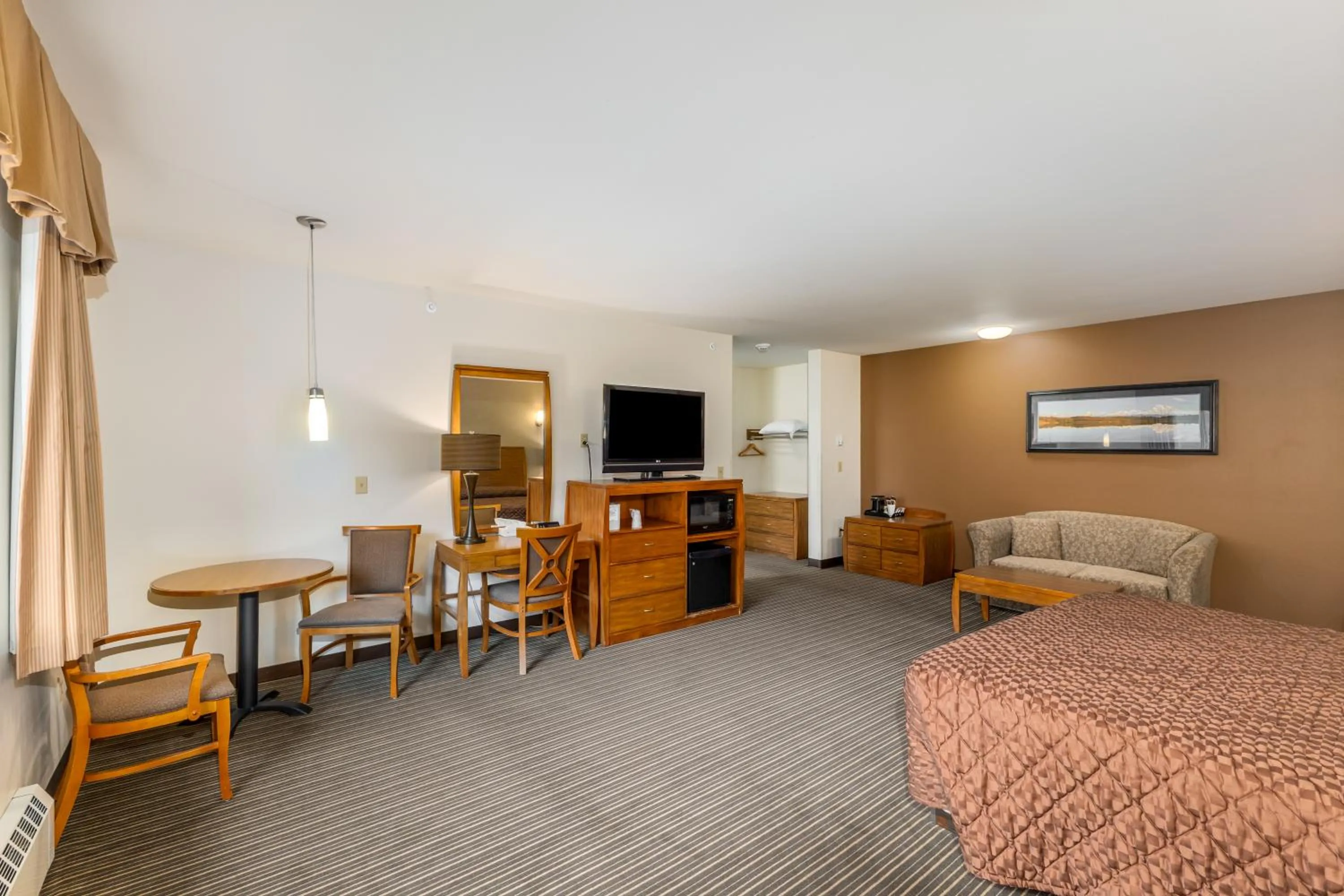 Bed in Breeze Inn Hotel & Motel