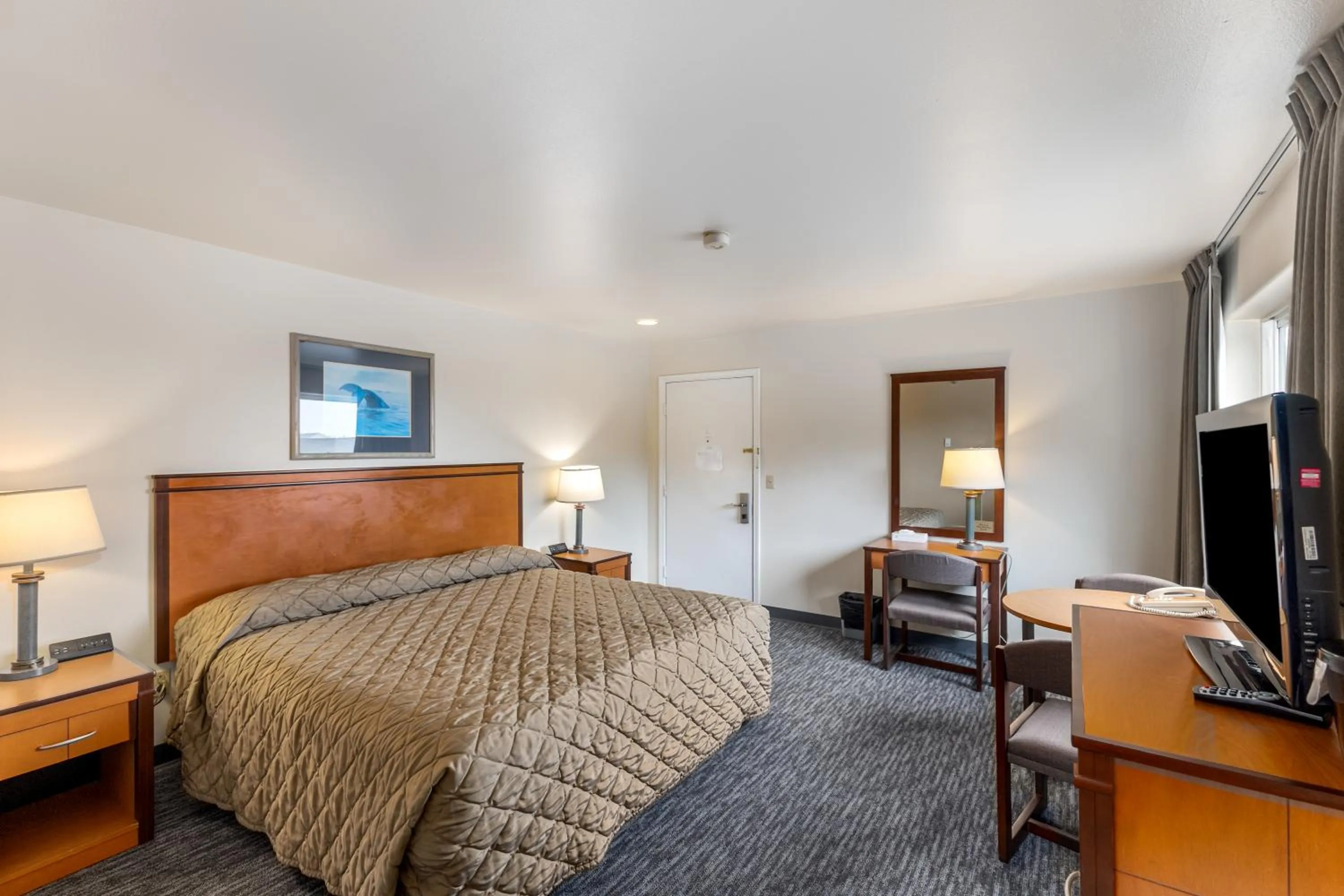 Bed in Breeze Inn Hotel & Motel