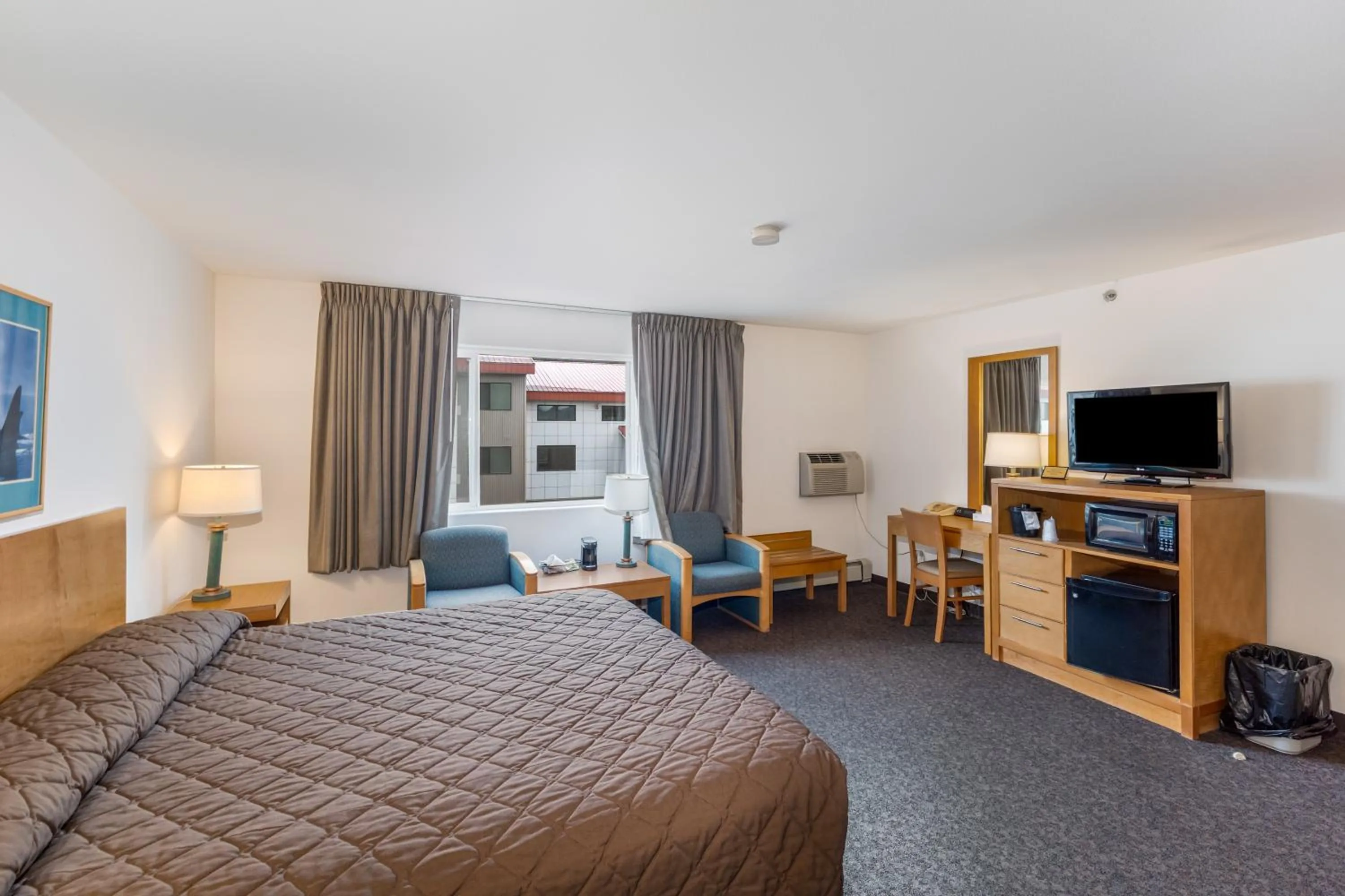 Bed in Breeze Inn Hotel & Motel