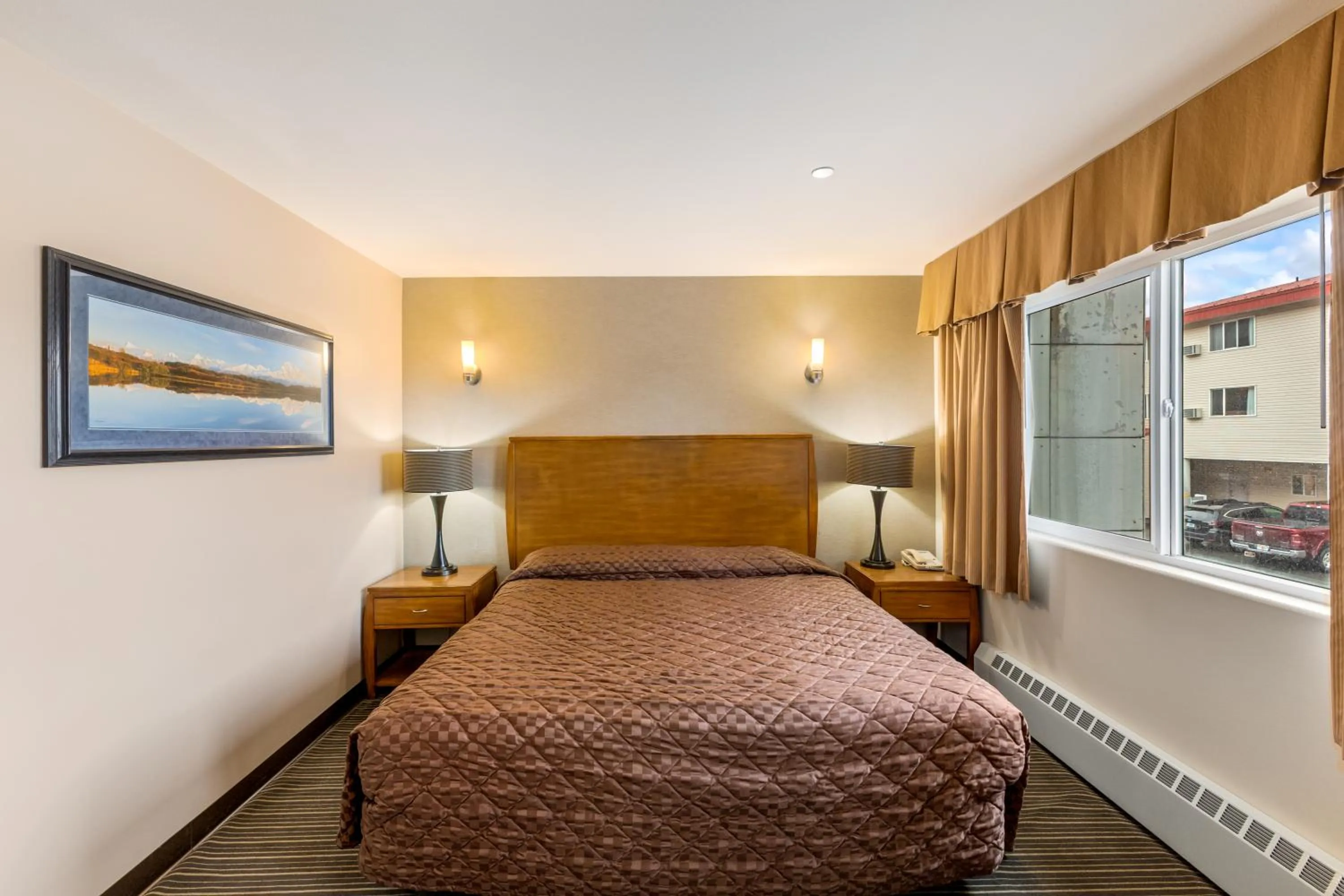 Bed in Breeze Inn Hotel & Motel