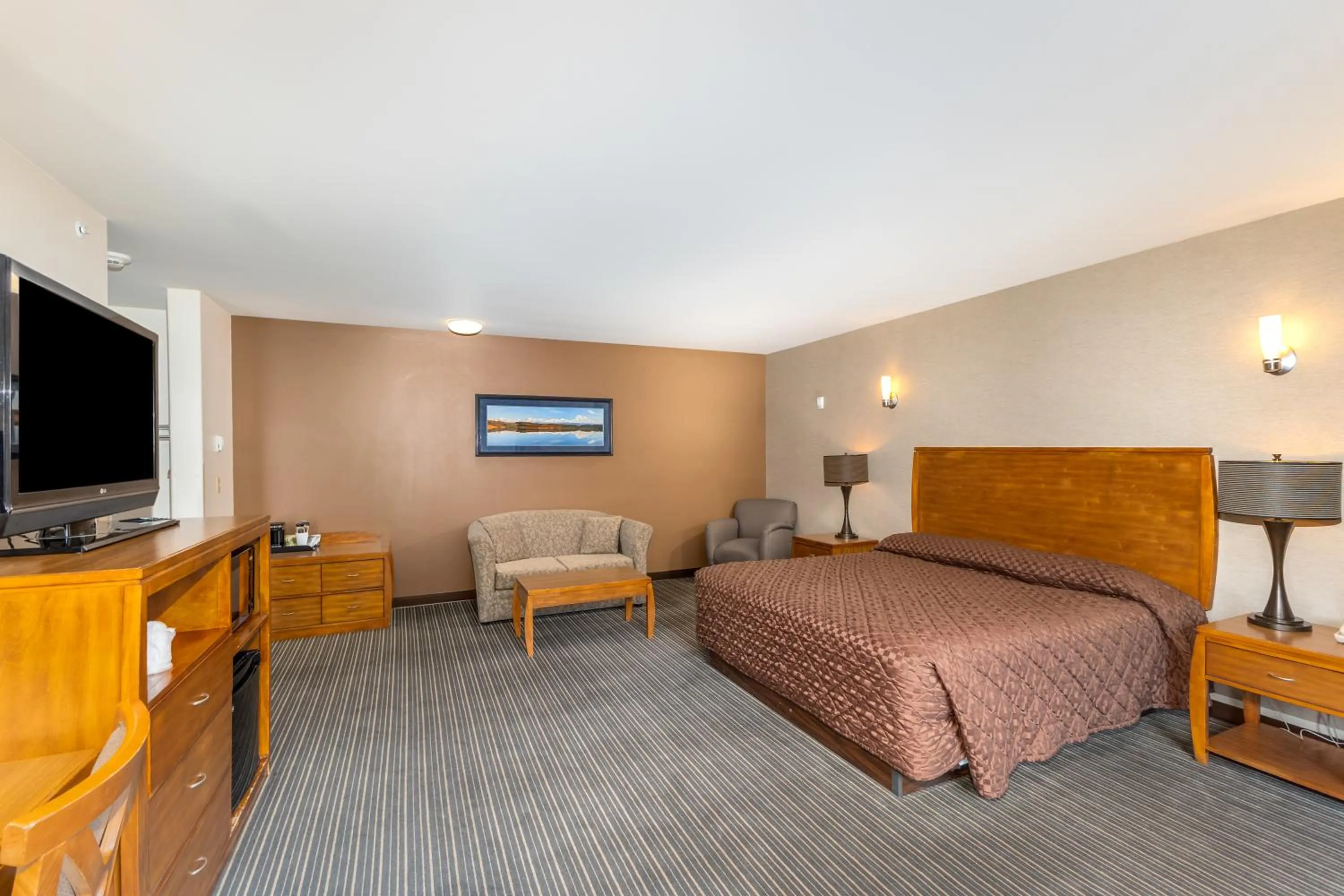 Bed in Breeze Inn Hotel & Motel