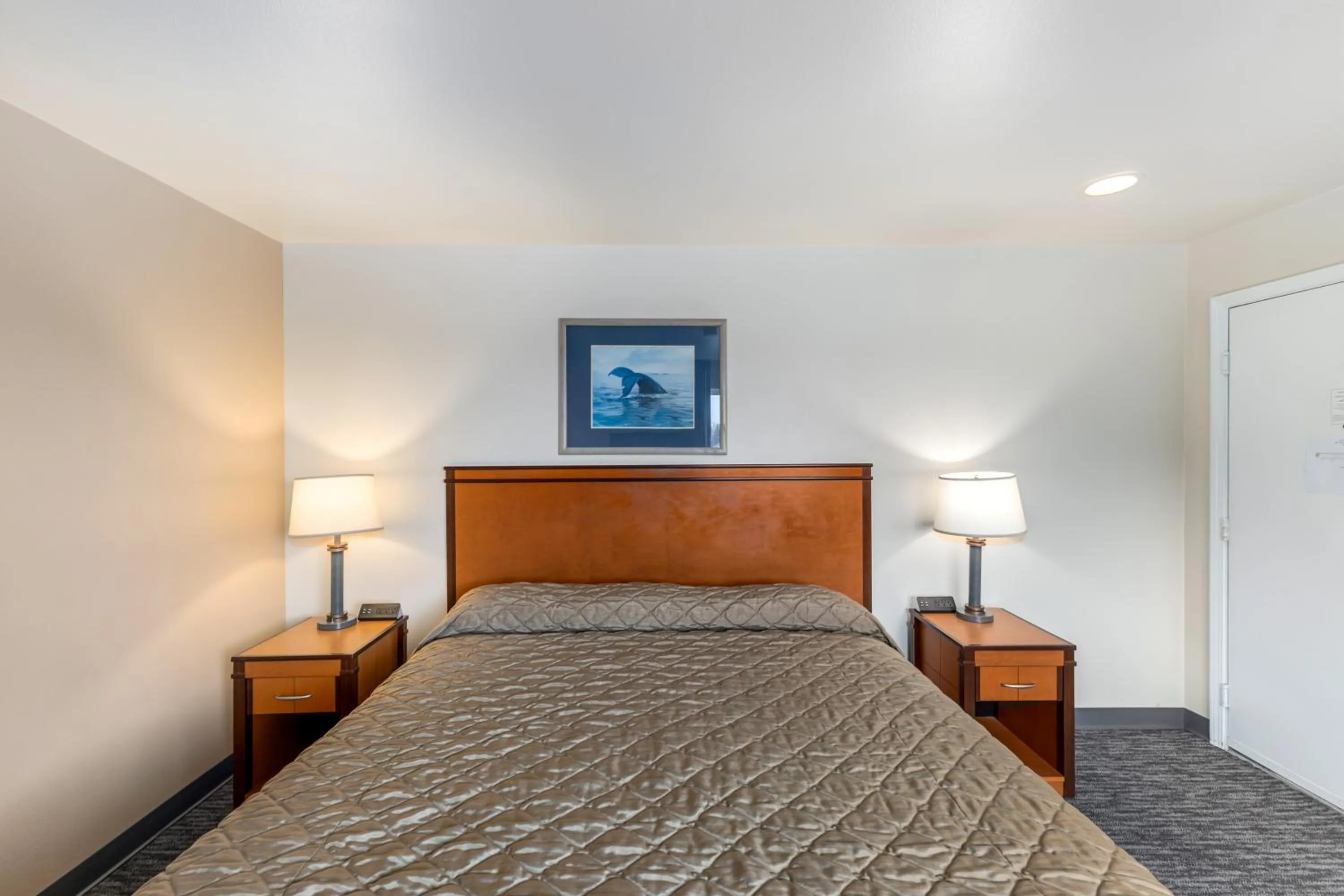 Bed in Breeze Inn Hotel & Motel