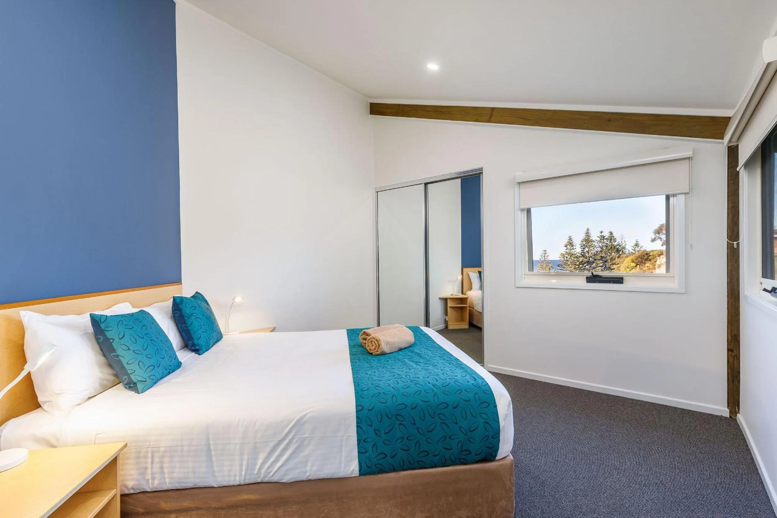 Bed in Tathra Beach House Holiday Apartments