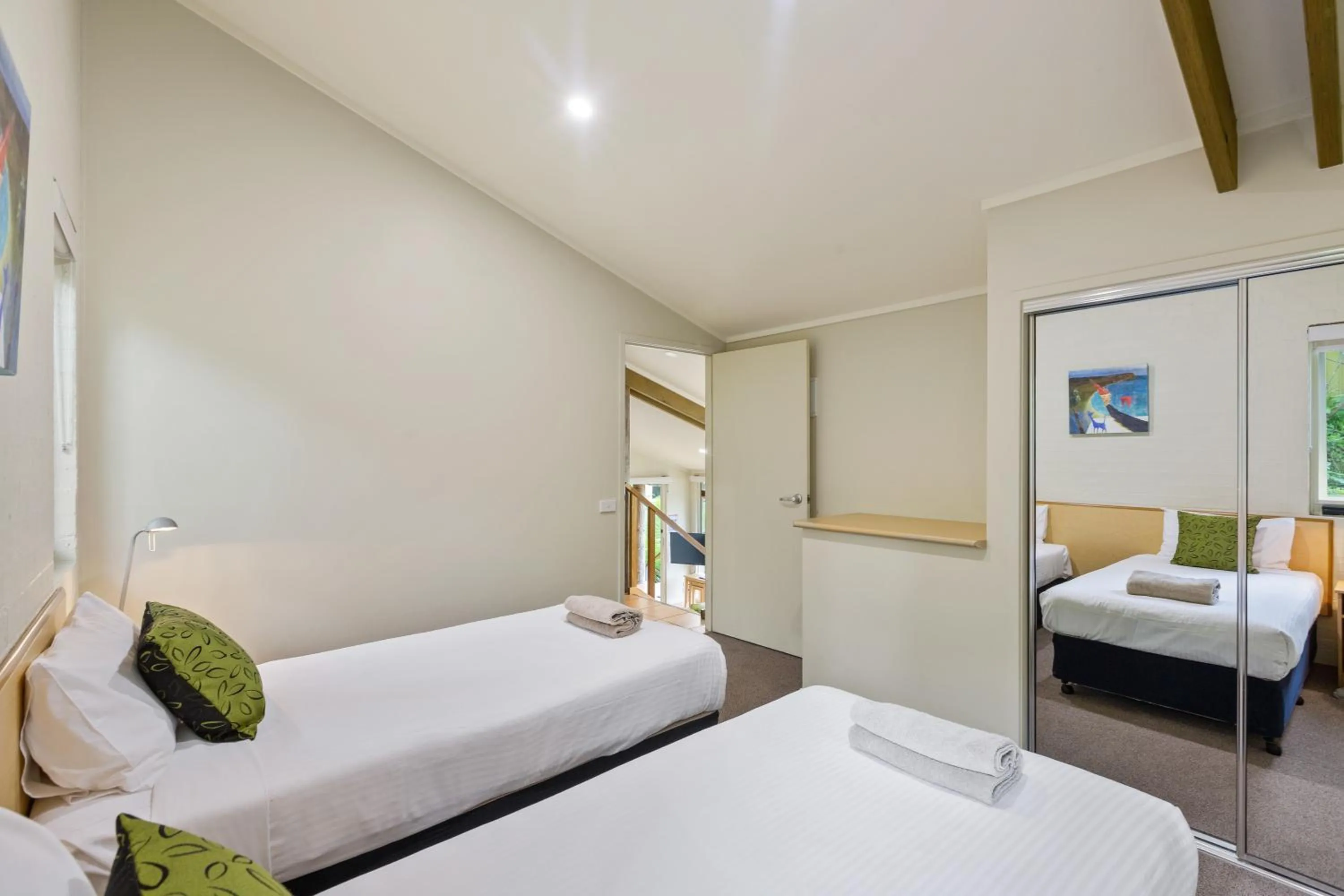 Bed in Tathra Beach House Holiday Apartments