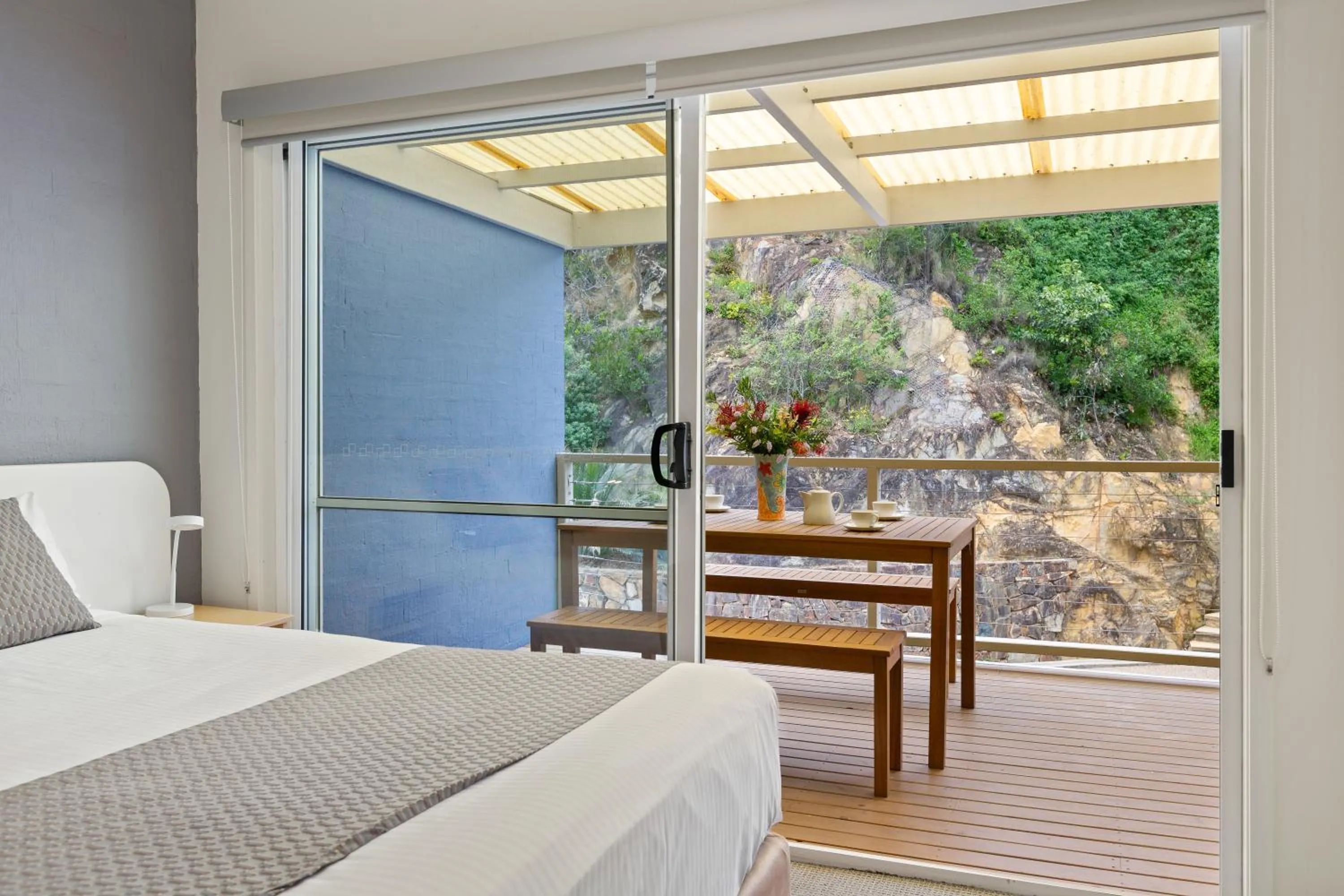 Bed in Tathra Beach House Holiday Apartments