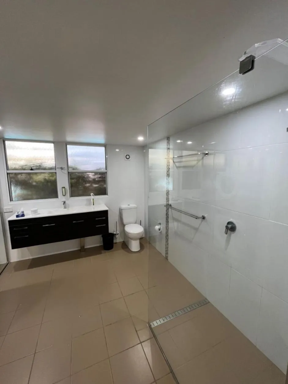 Shower in Tathra Beach House Holiday Apartments