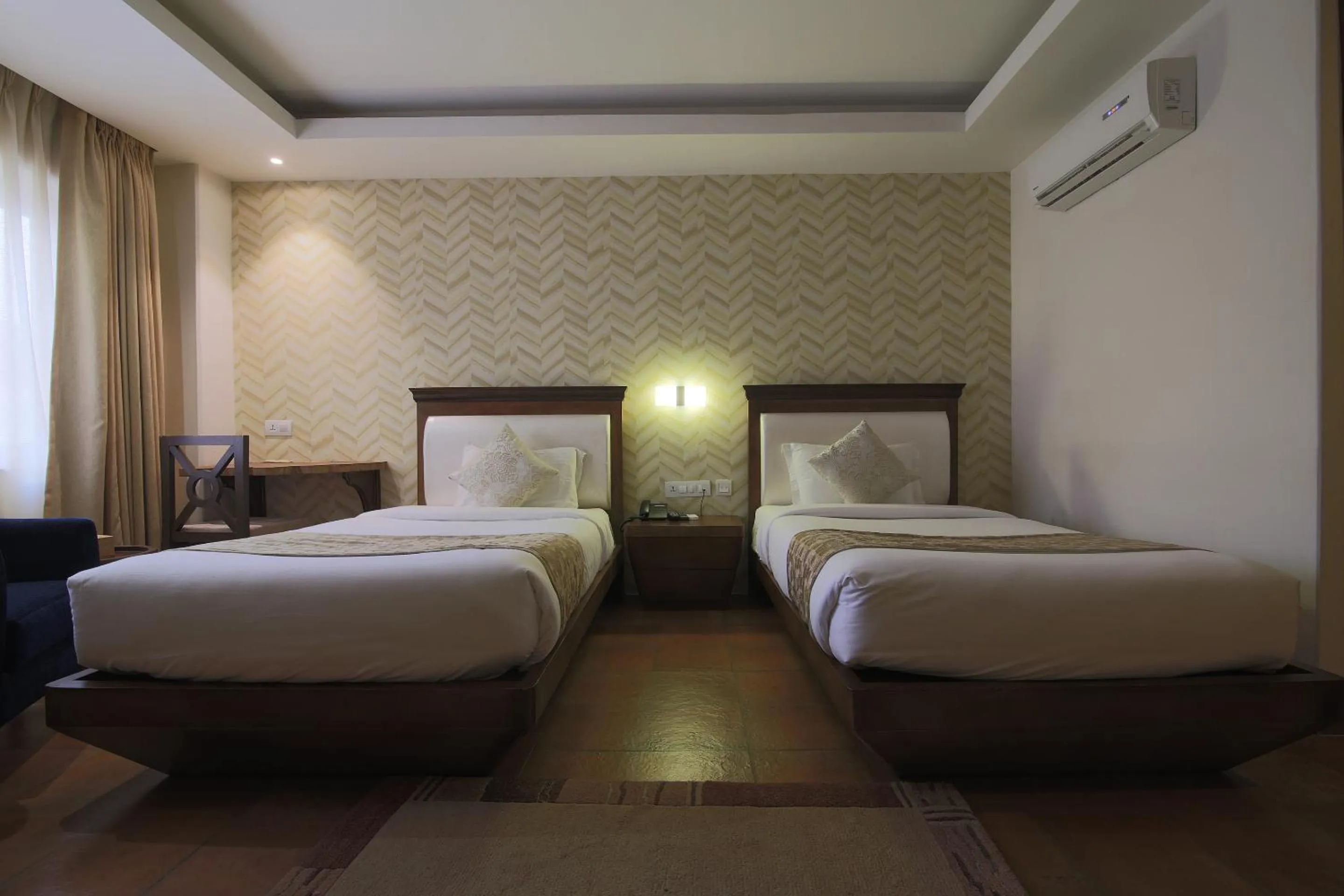Bed in Teeka Resort Suites & Spa