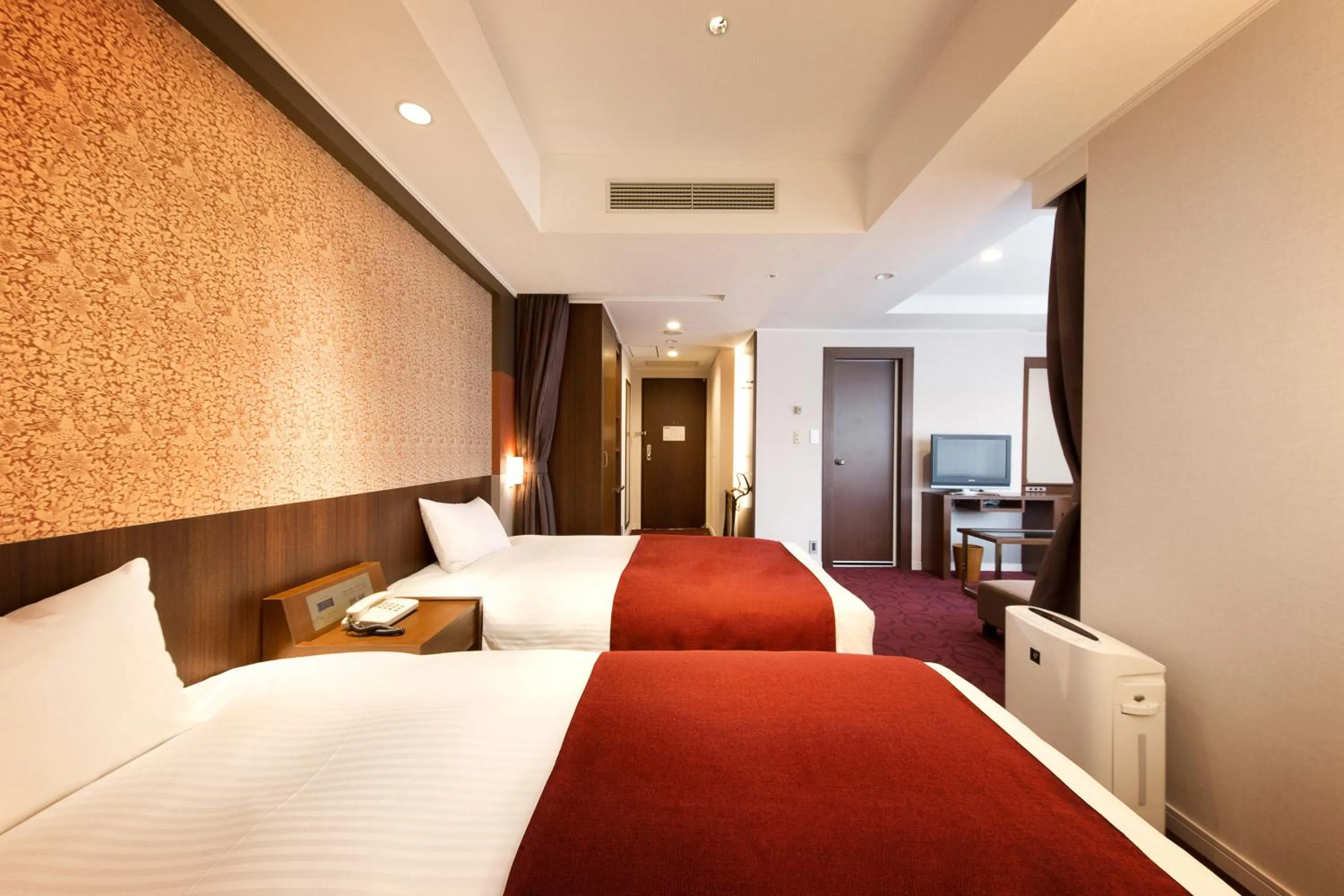 Bed in Kokusai 21 International Hotel