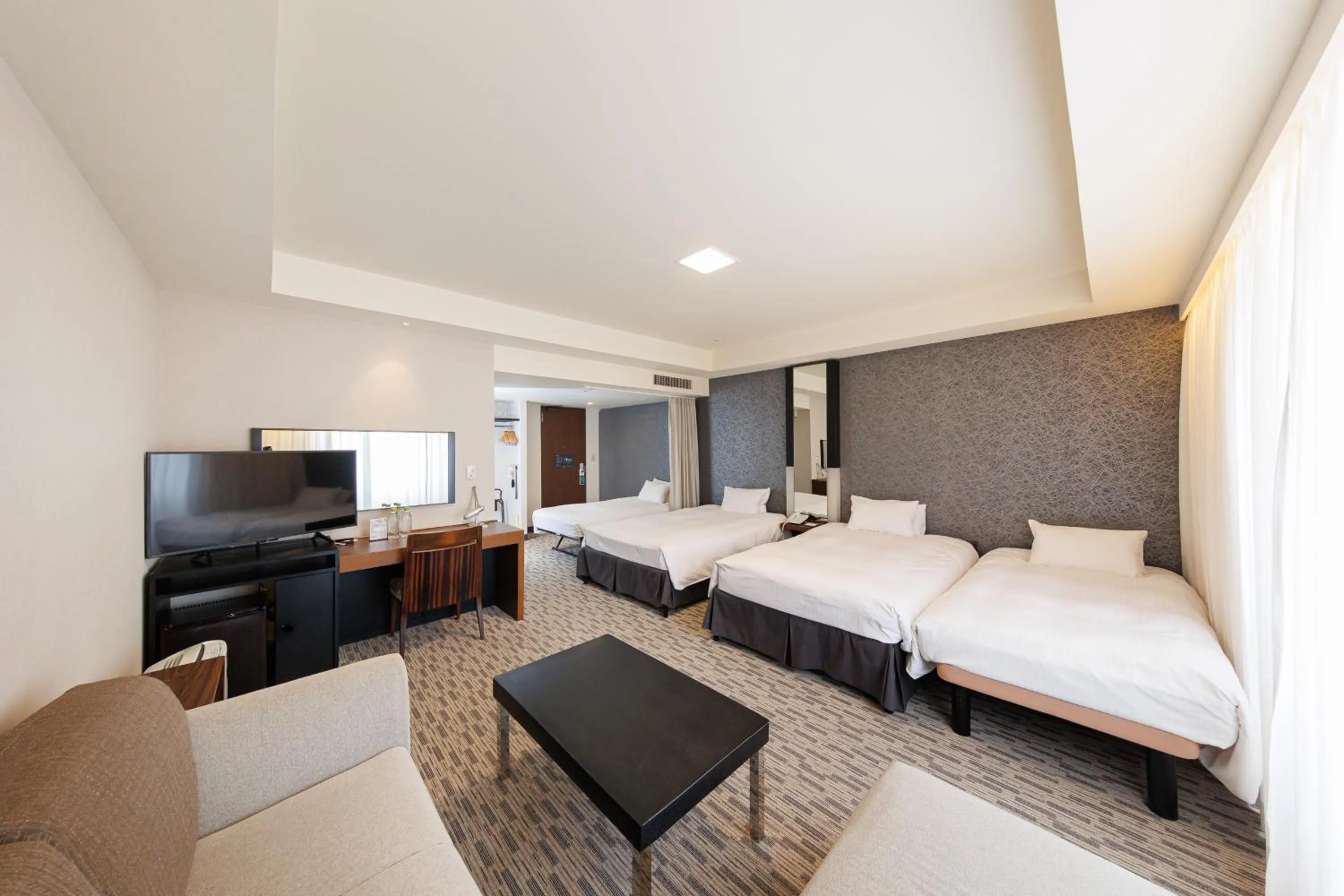 Bed in Kokusai 21 International Hotel