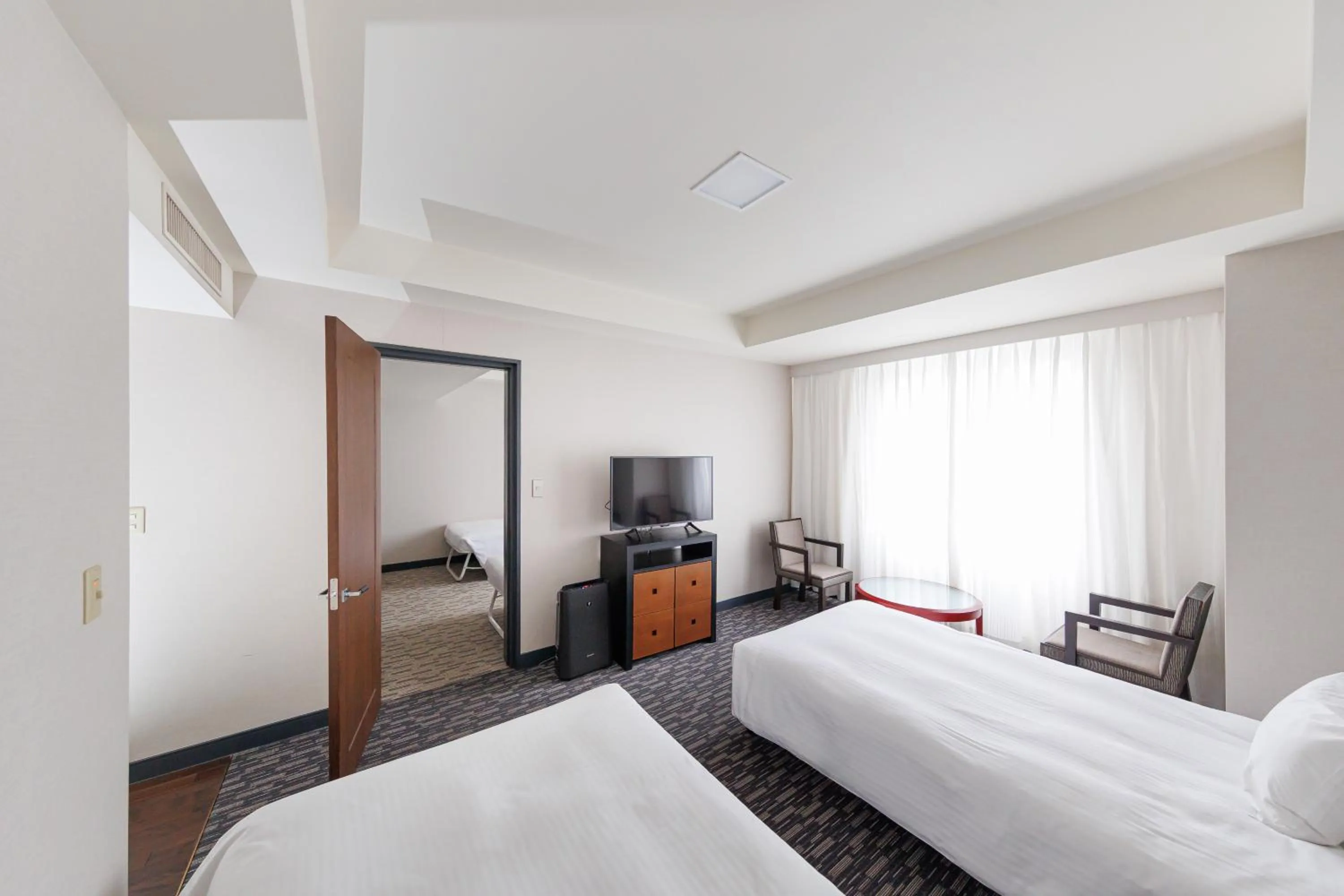 Bed in Kokusai 21 International Hotel