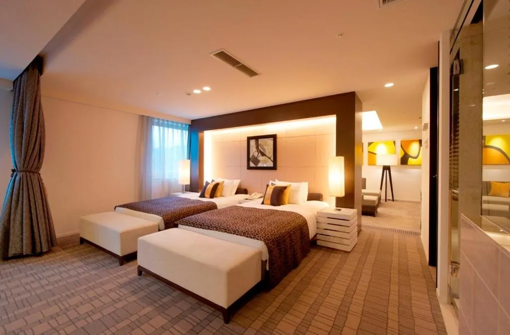 Bed in Kokusai 21 International Hotel