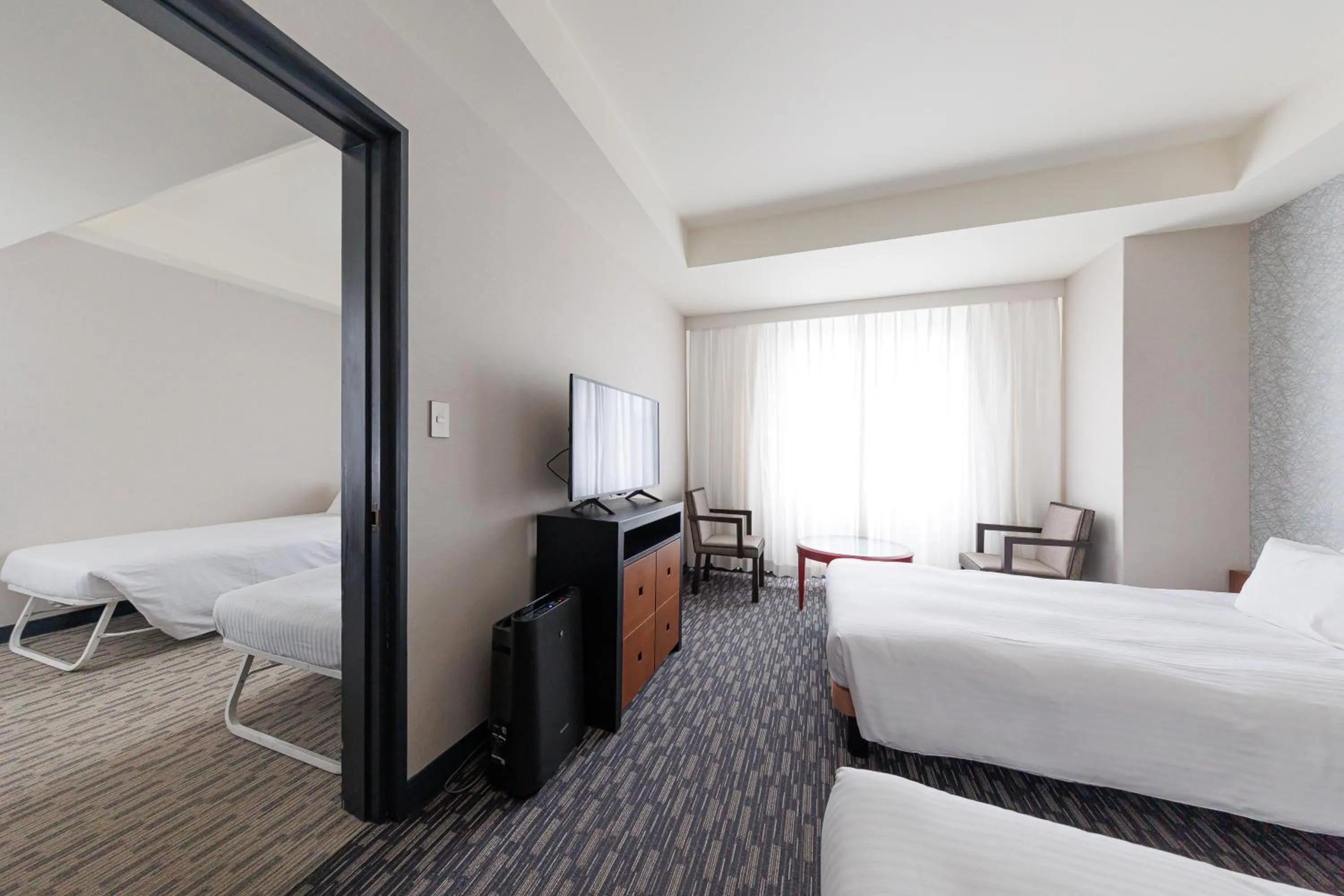 Bed in Kokusai 21 International Hotel