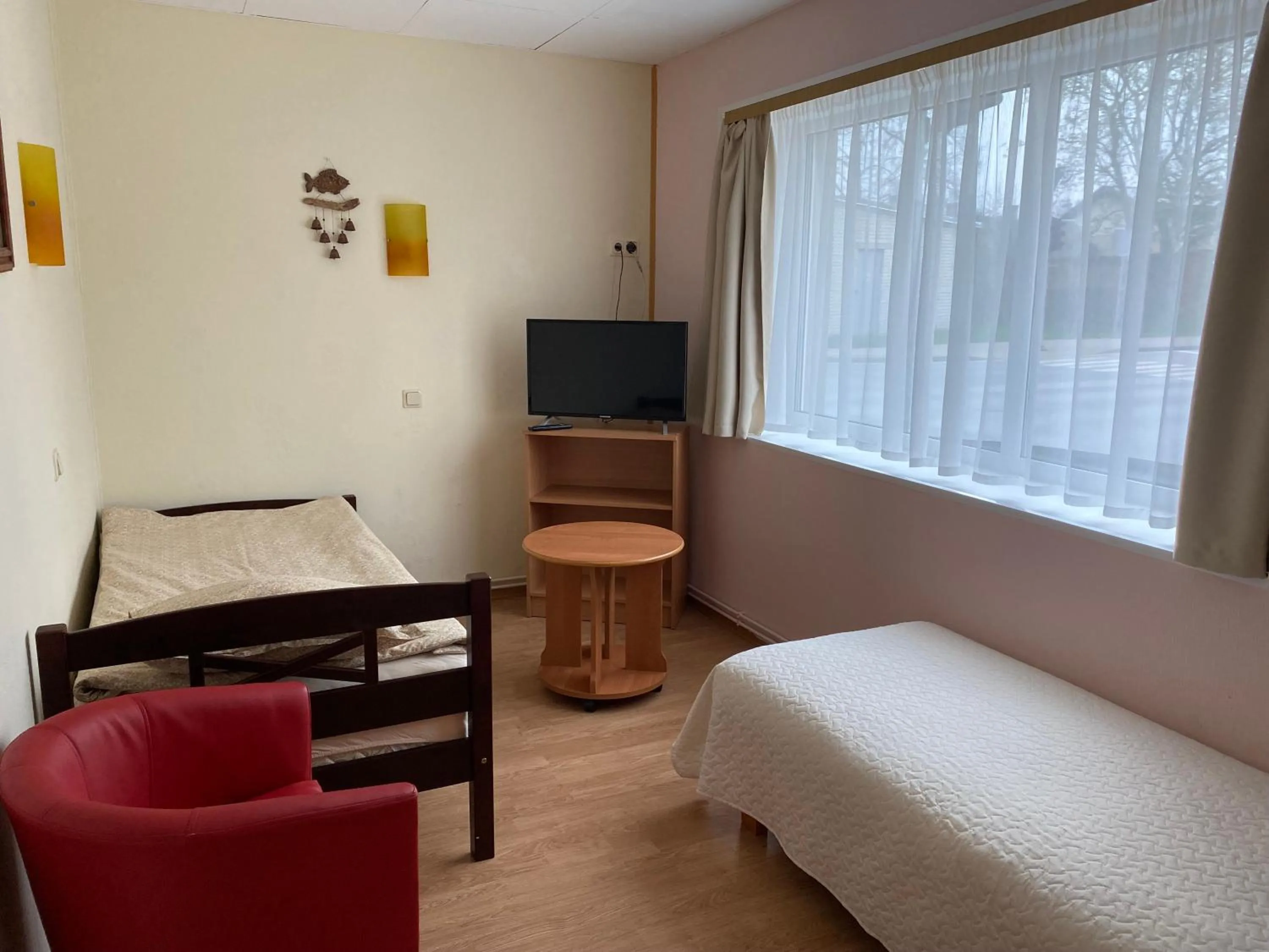 Bed in Apartment Hotel Rubini