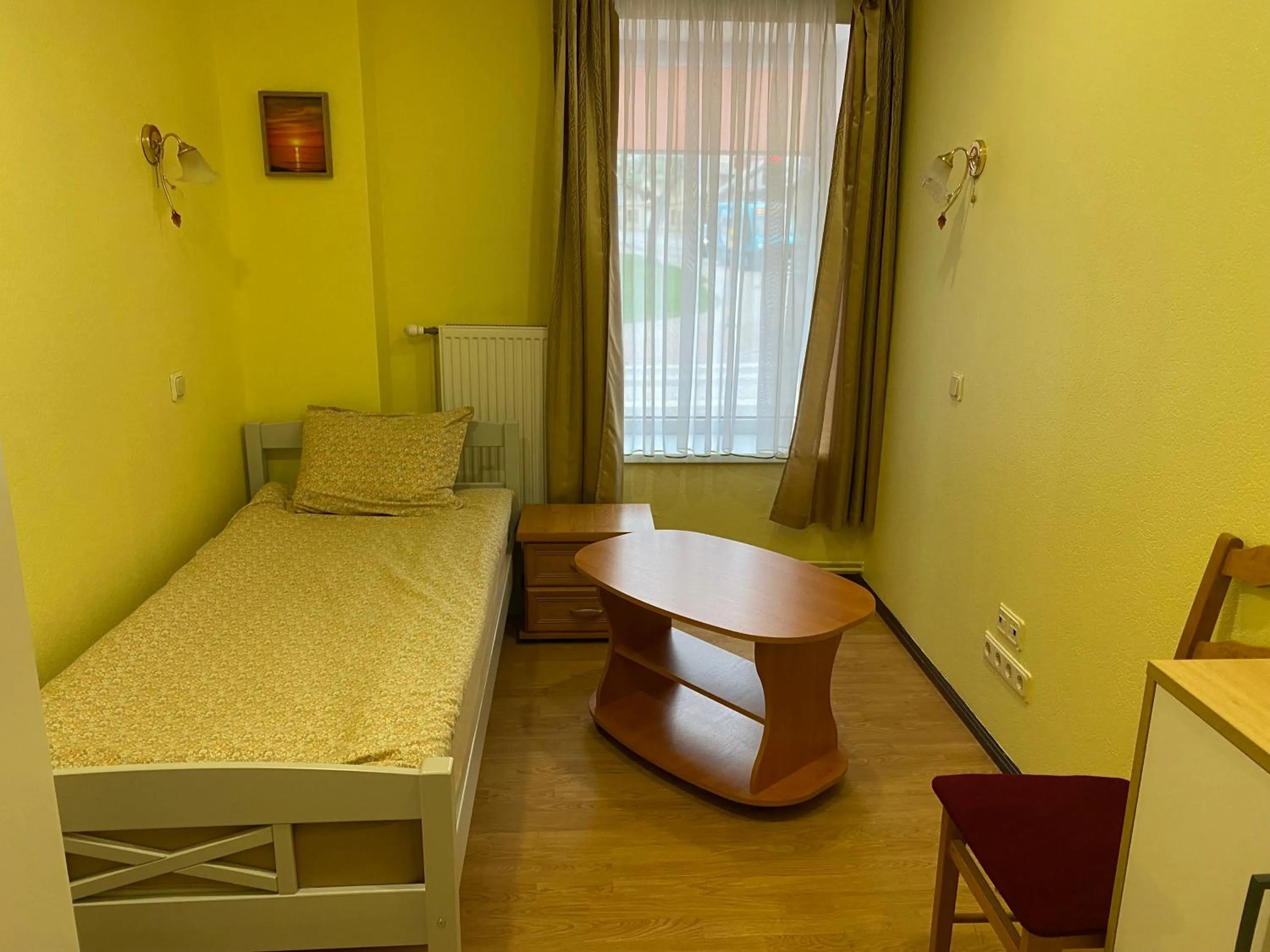 Bed in Apartment Hotel Rubini