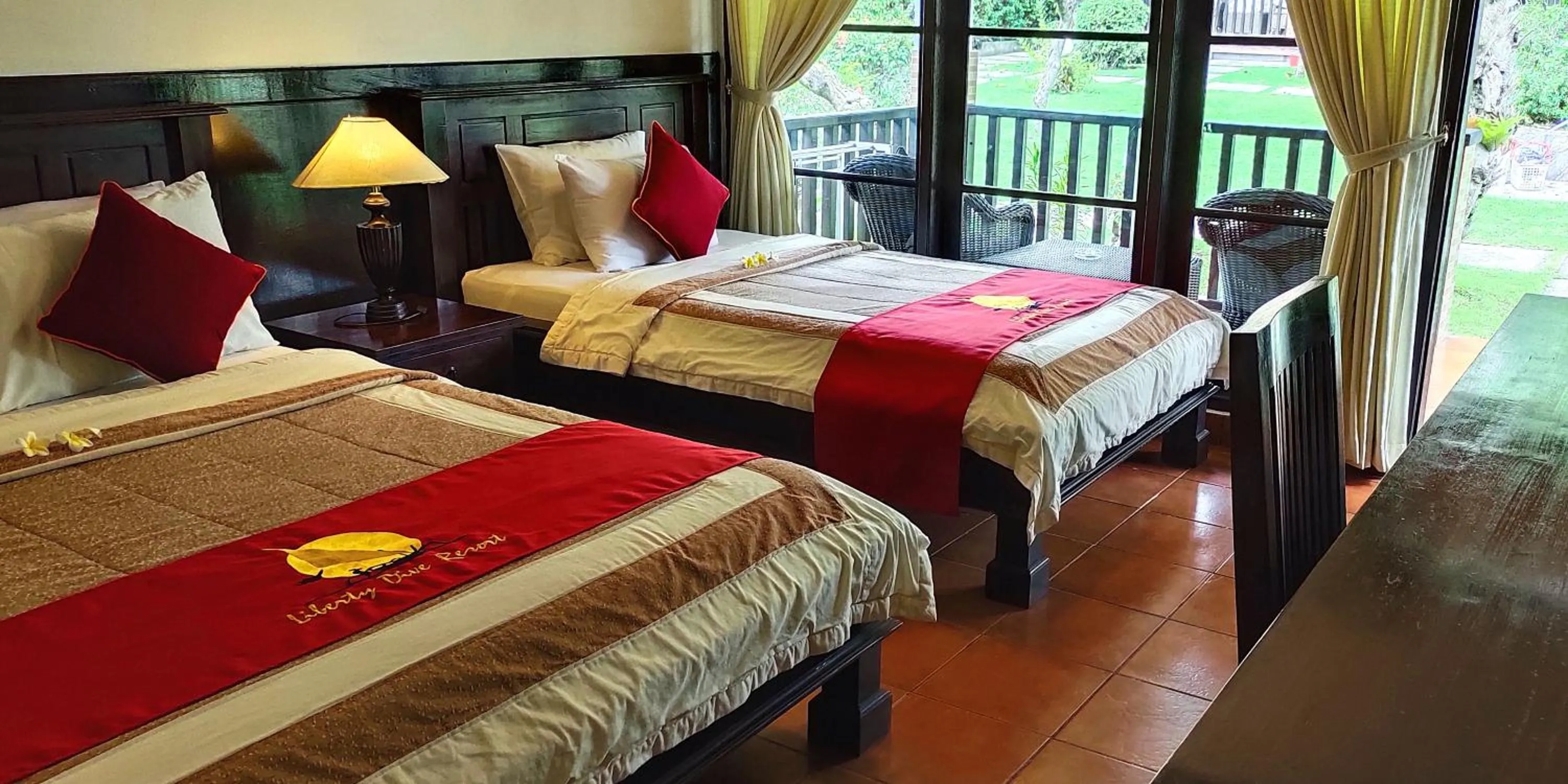 Bed in Liberty Dive Resort