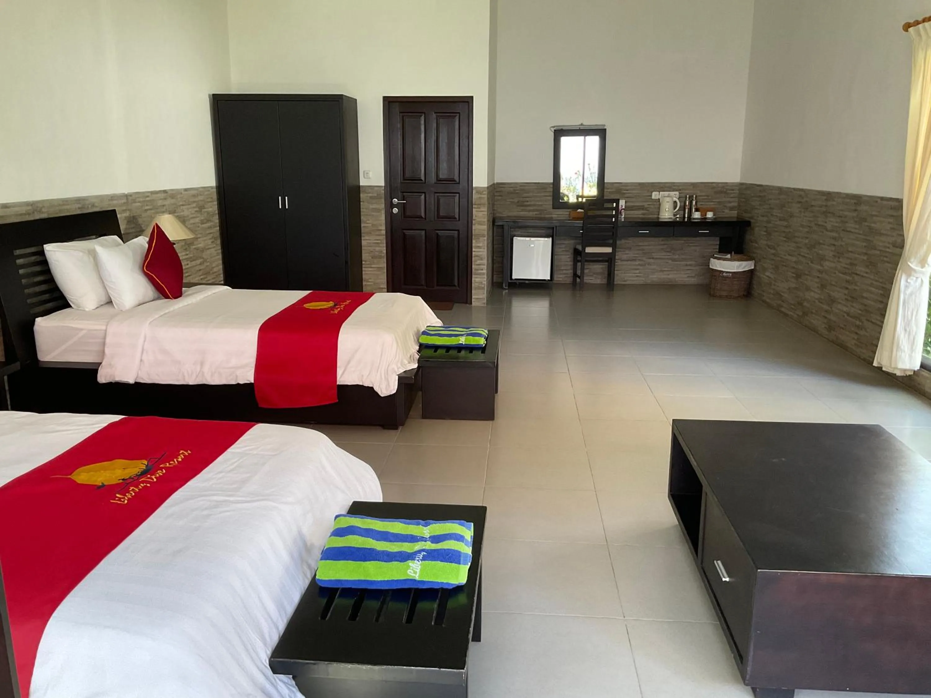 Bed in Liberty Dive Resort