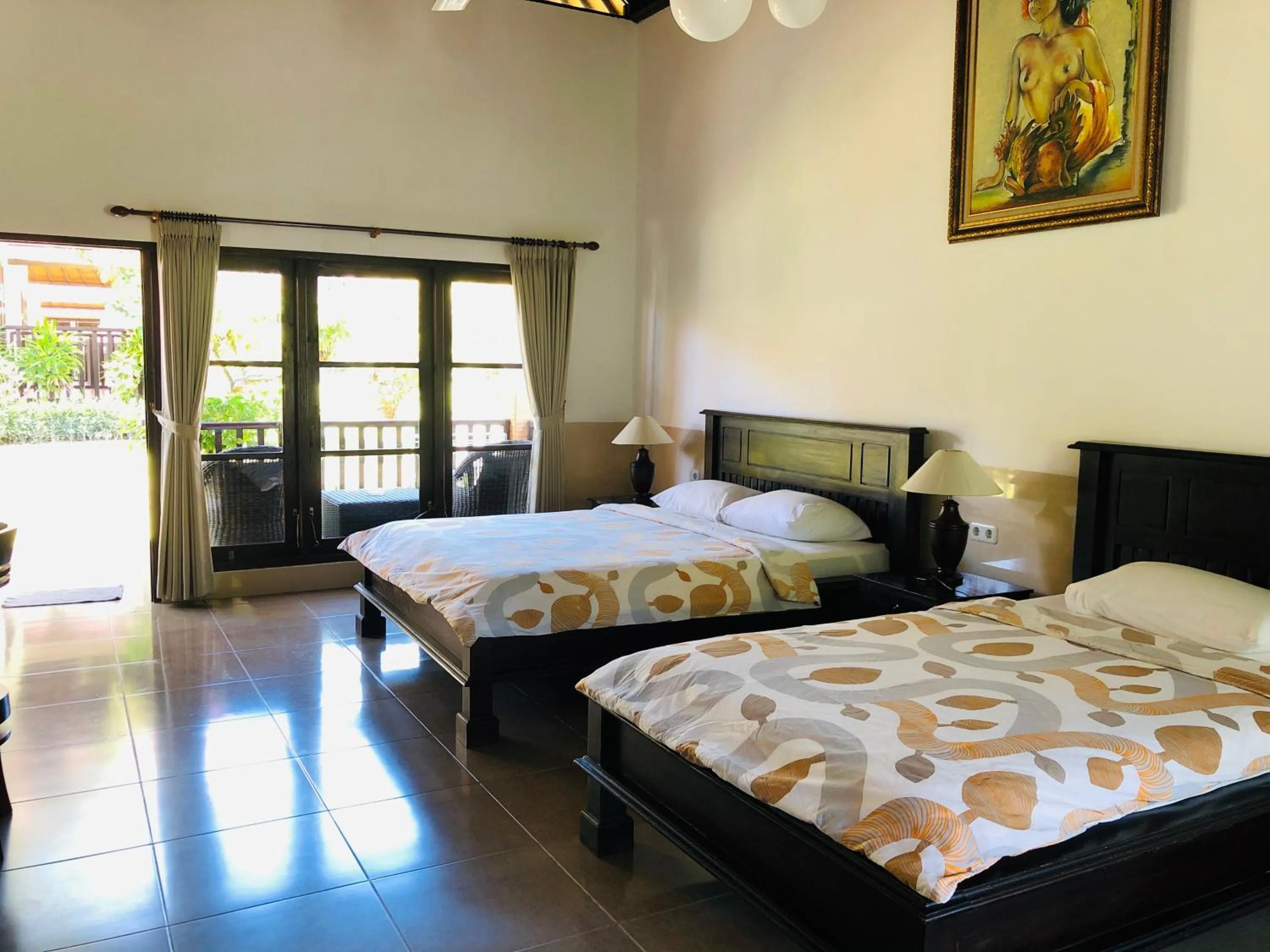 Bed in Liberty Dive Resort