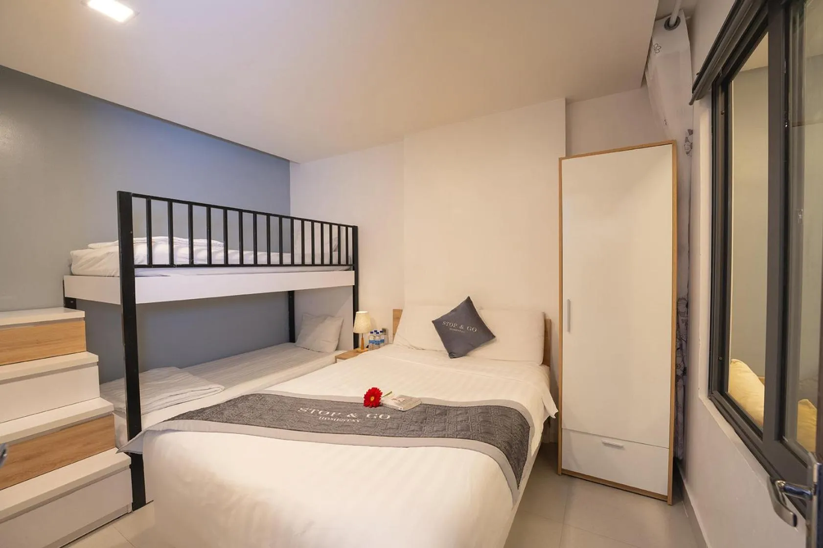 Bed in Stop and Go Boutique Homestay Hue