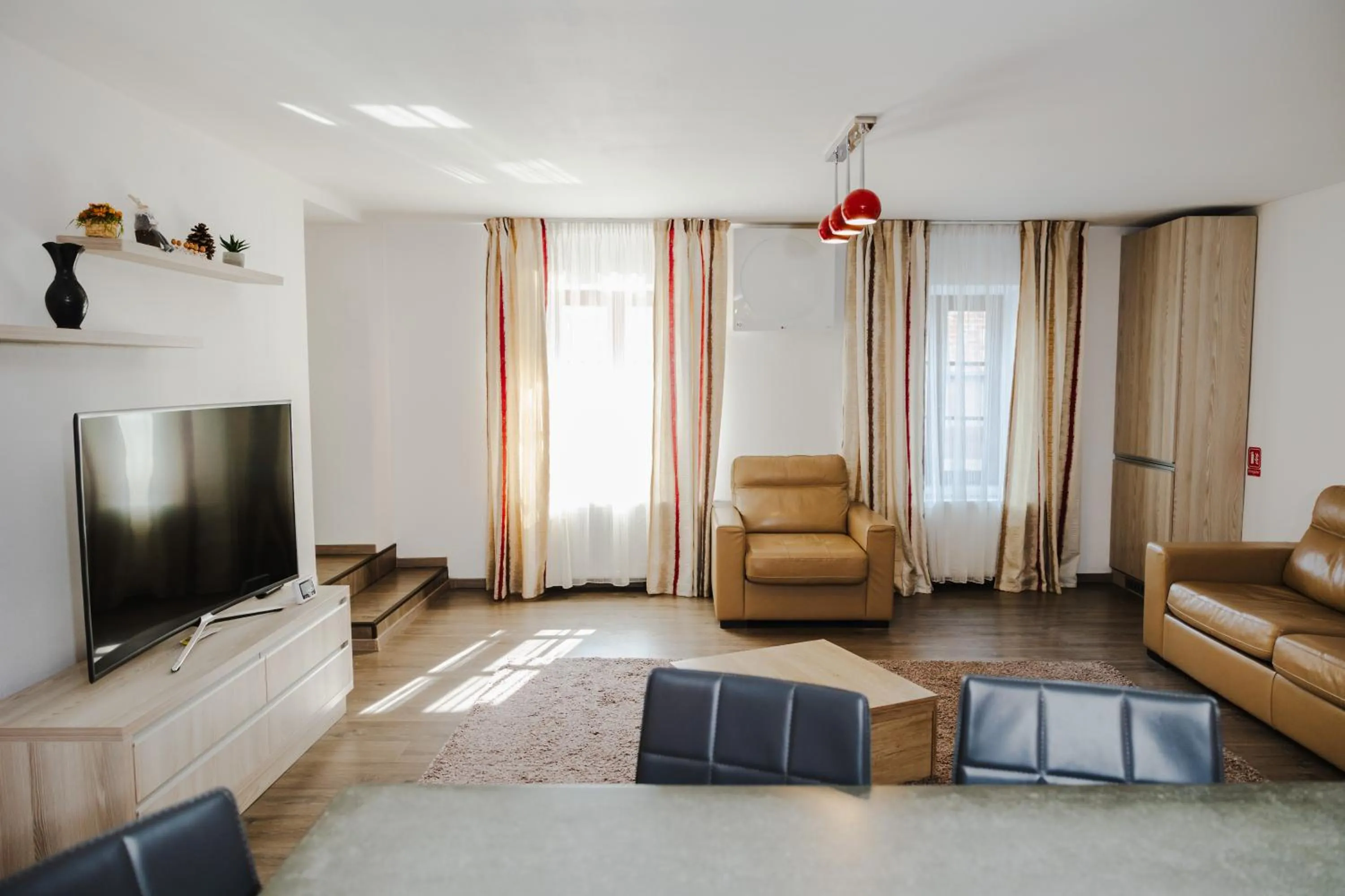 Communal lounge/ TV room in Casa Nicolae Luxury Suites