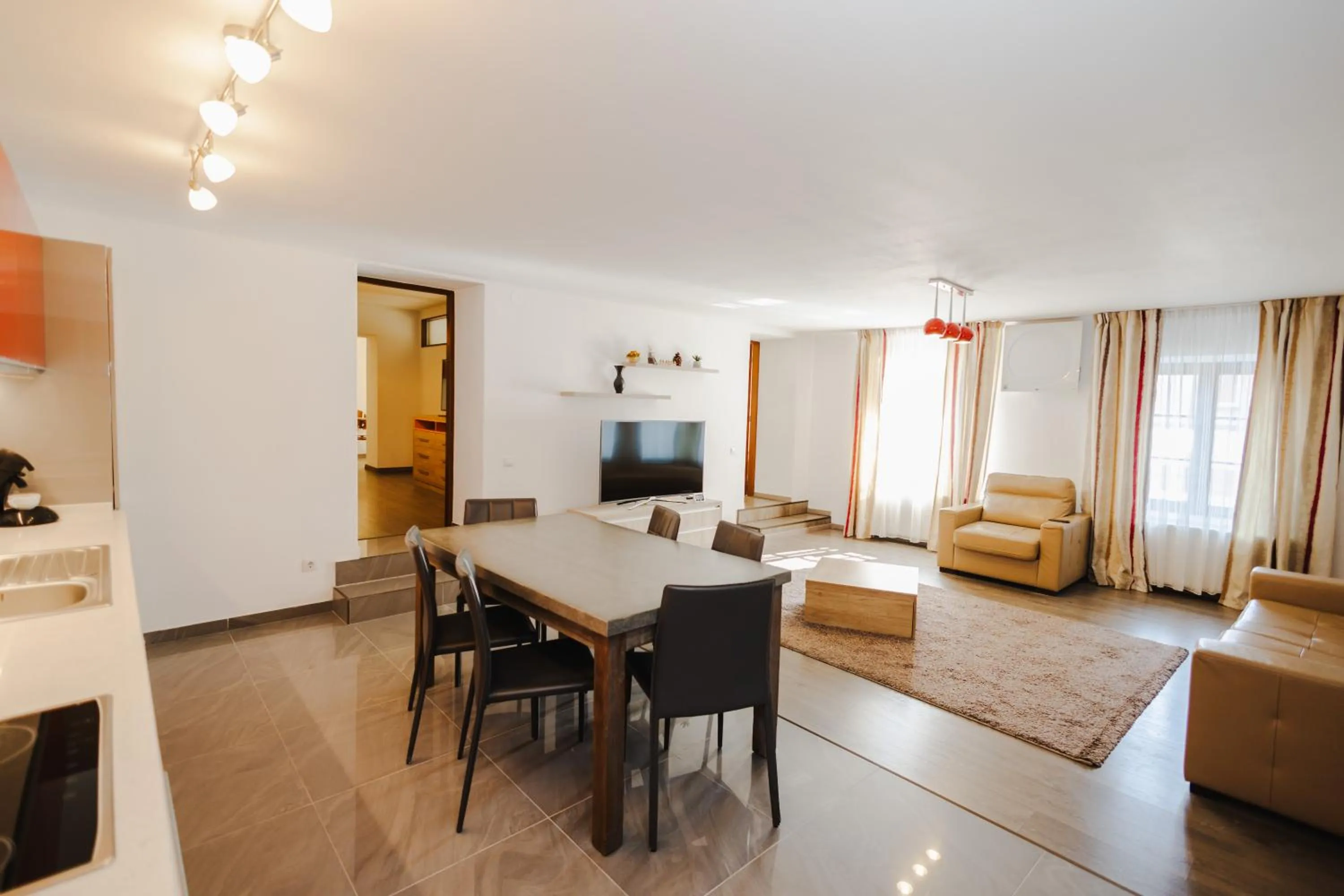 Communal lounge/ TV room in Casa Nicolae Luxury Suites