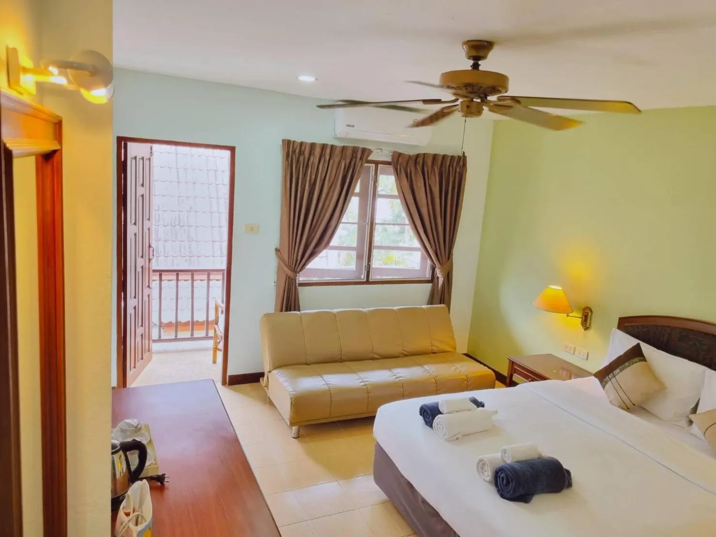 Photo of the whole room, Bed in Kata Interhouse Resort by Haii Collection