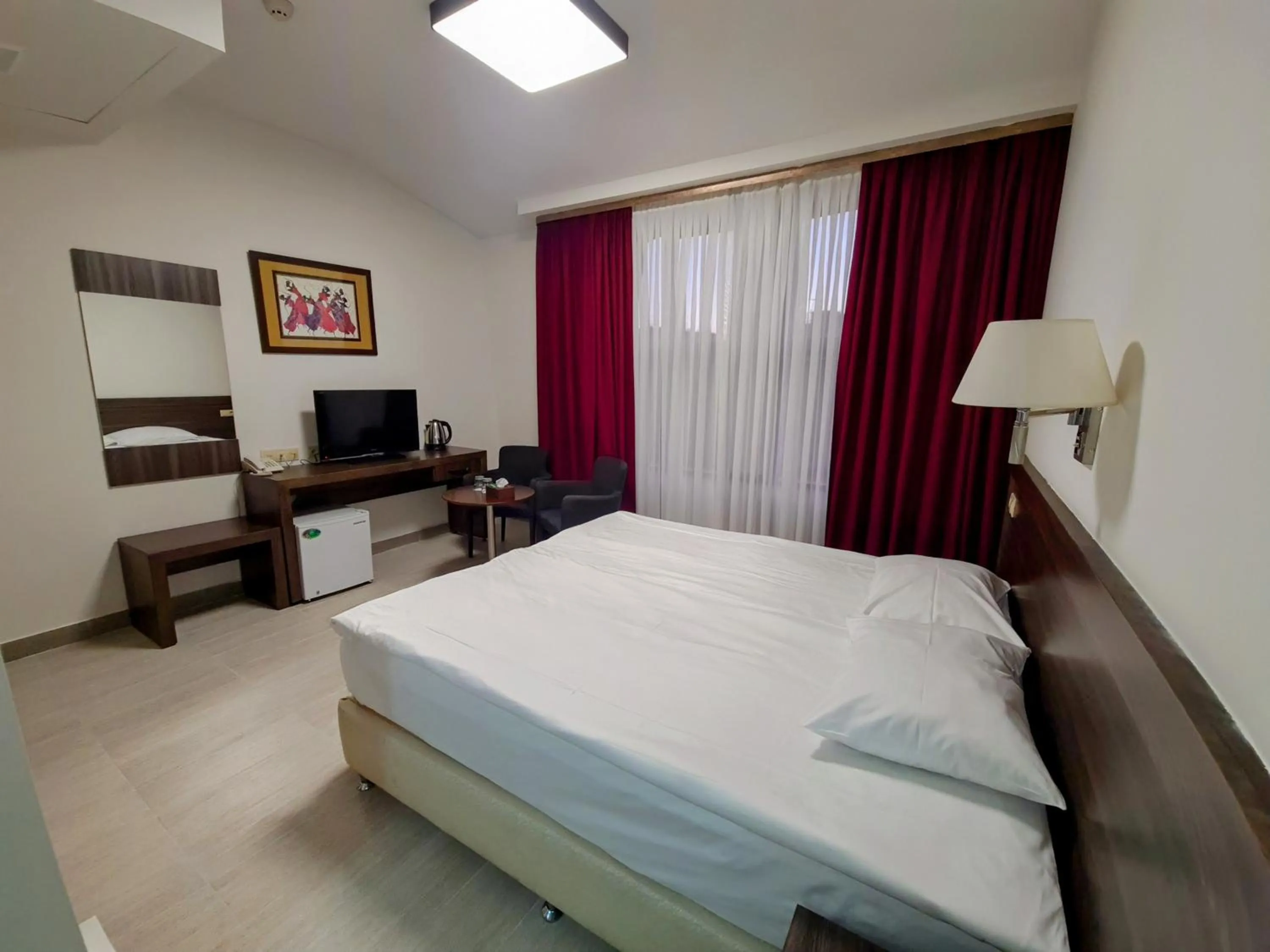 Bed in Yerevan Deluxe Hotel
