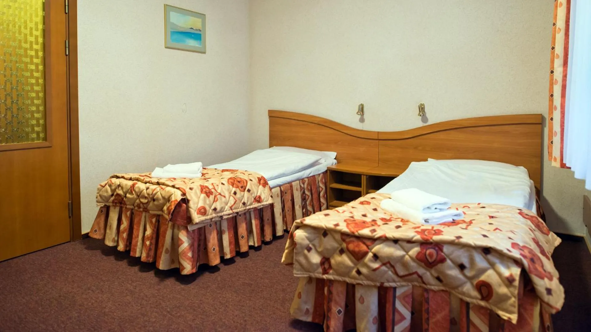 Bed in Hotel Kama Park