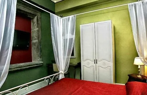 Photo of the whole room, Bed in Palazzo Riario