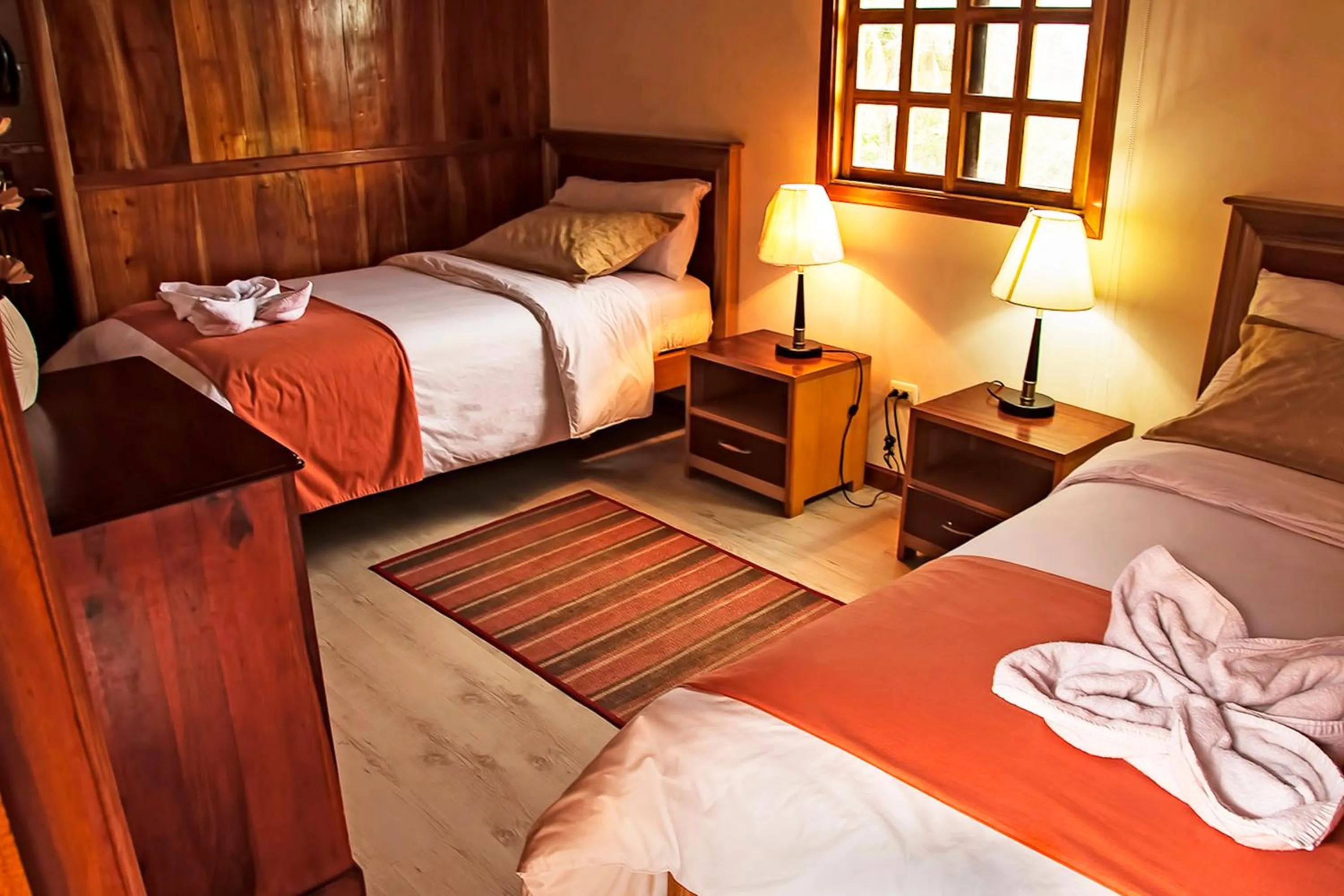 Bed in The Wooden House Hotel