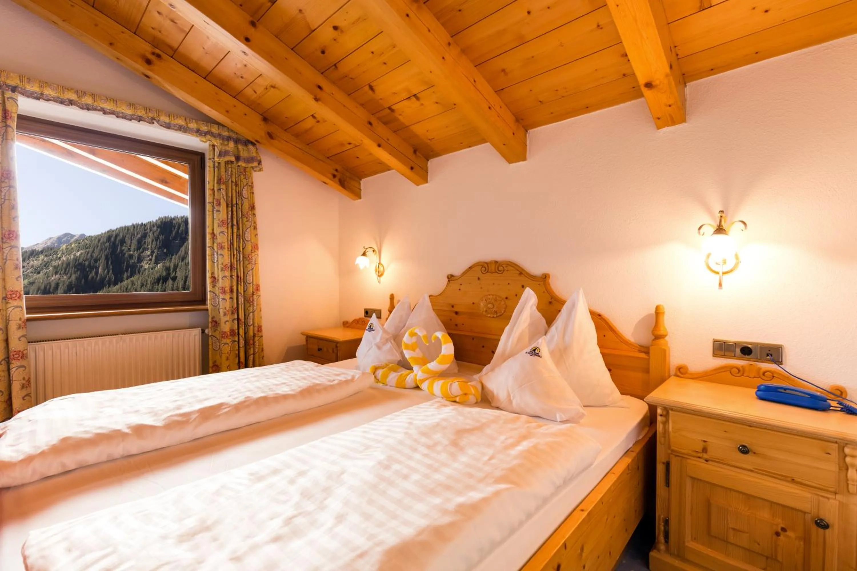 Bed in Hotel Schneeberg FAMILY SPA RESORT