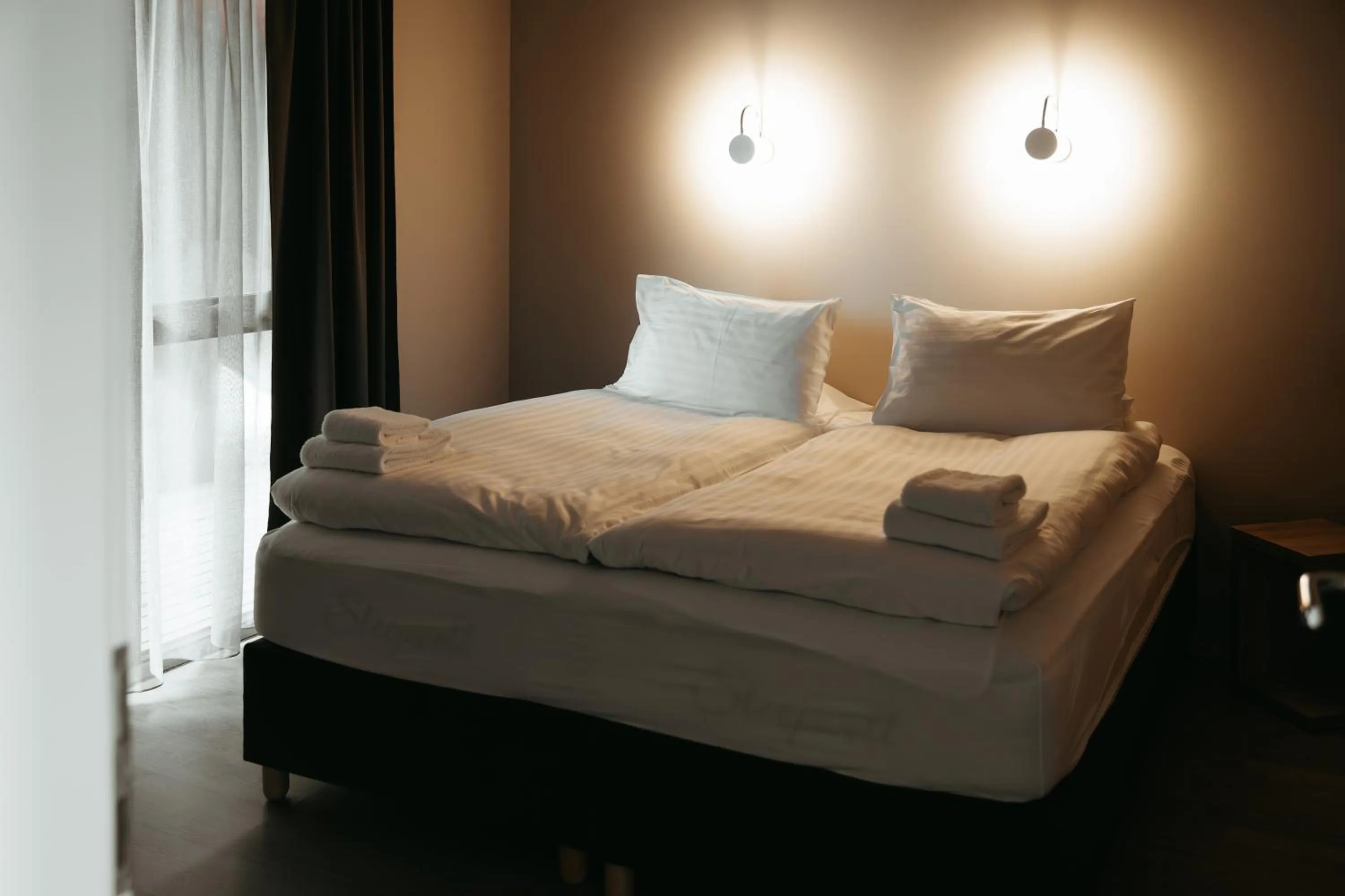 Bed in Vík Apartments