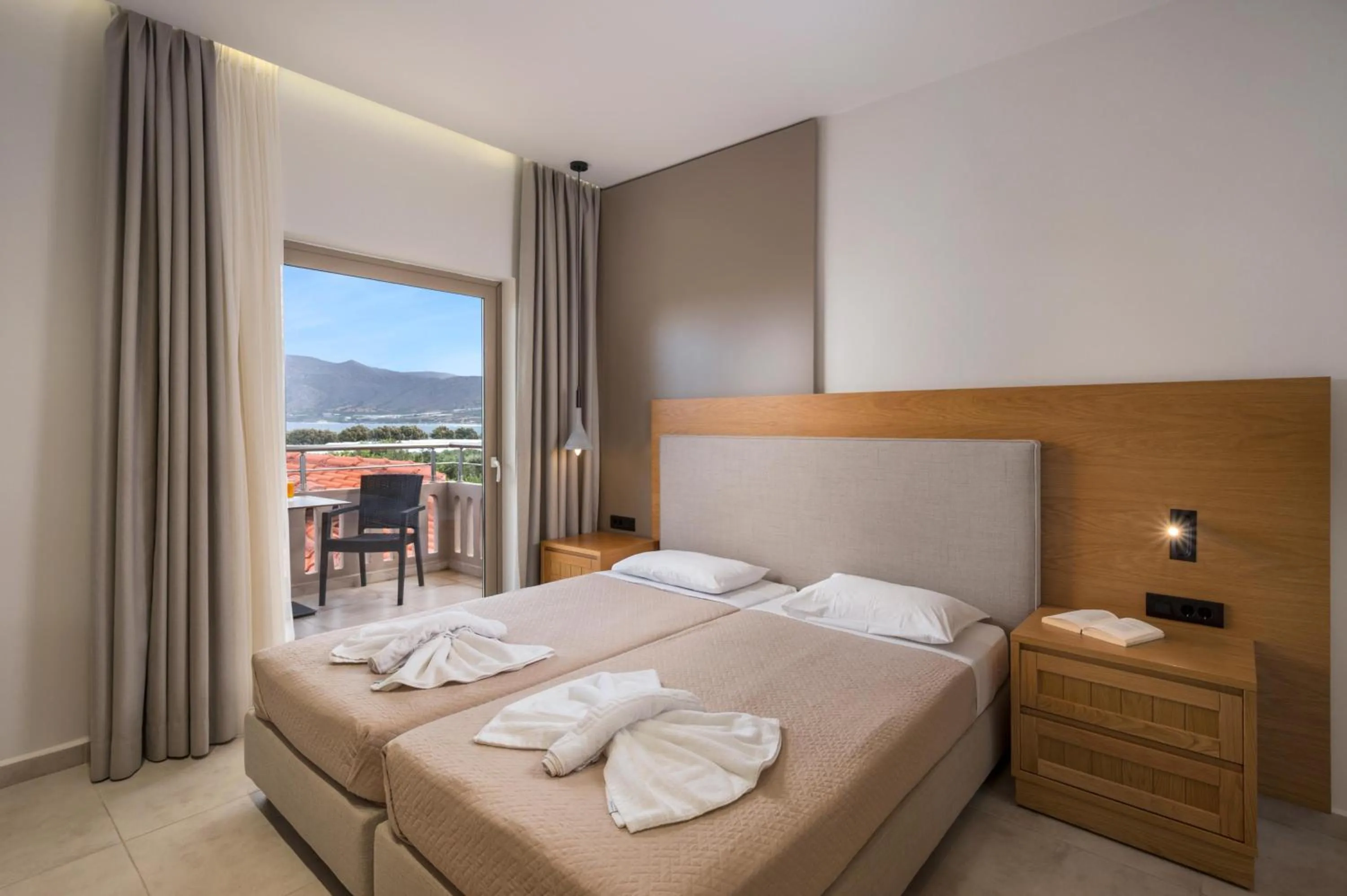 Bed in Petritos Rooms and Studios