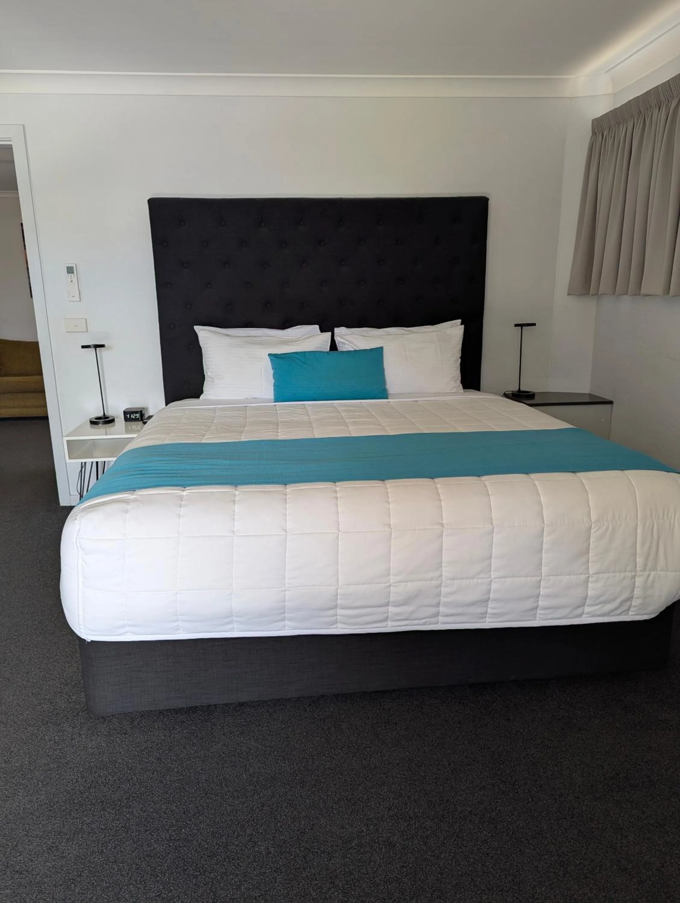 Bed in Araluen Motor Lodge