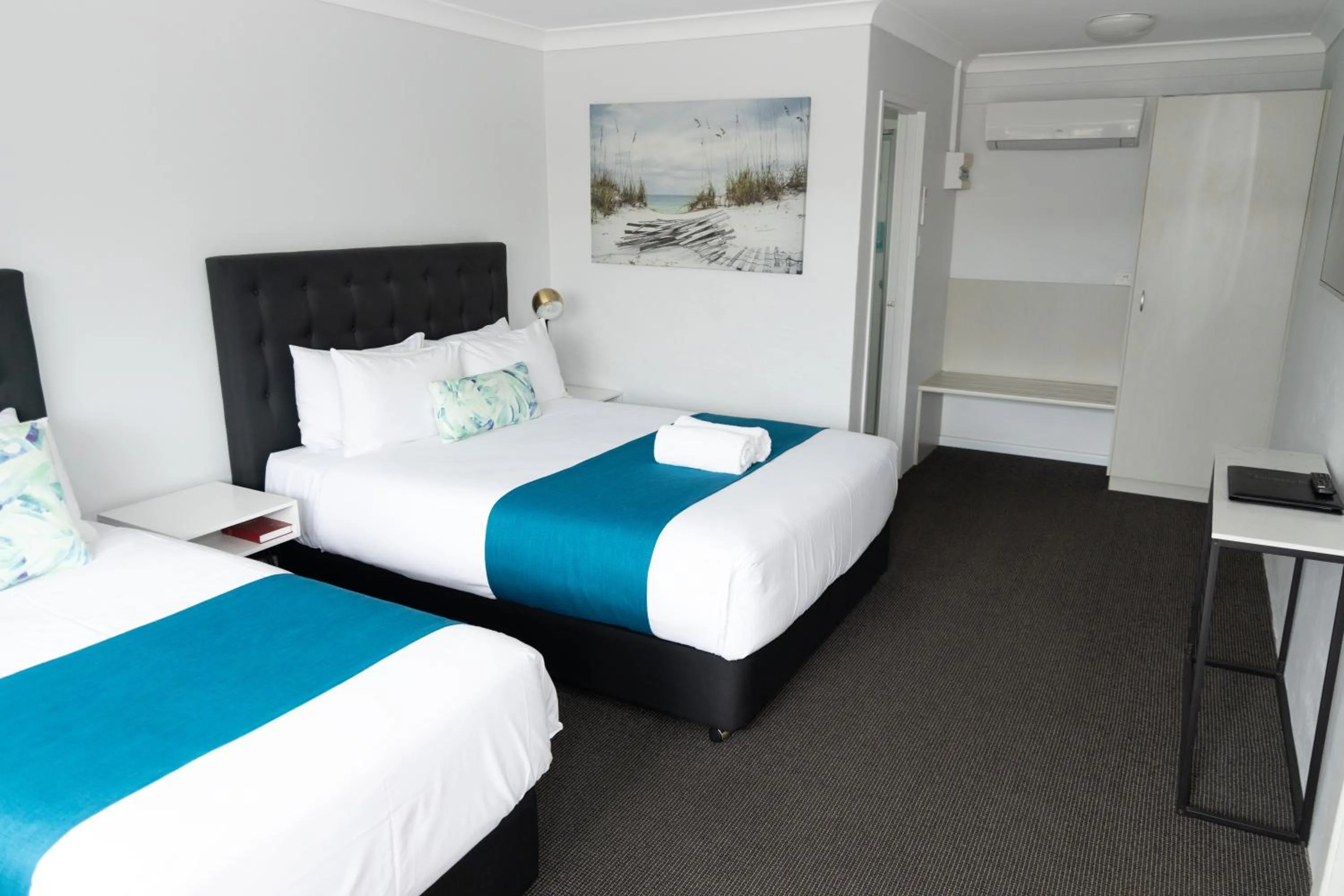 Bed in Araluen Motor Lodge