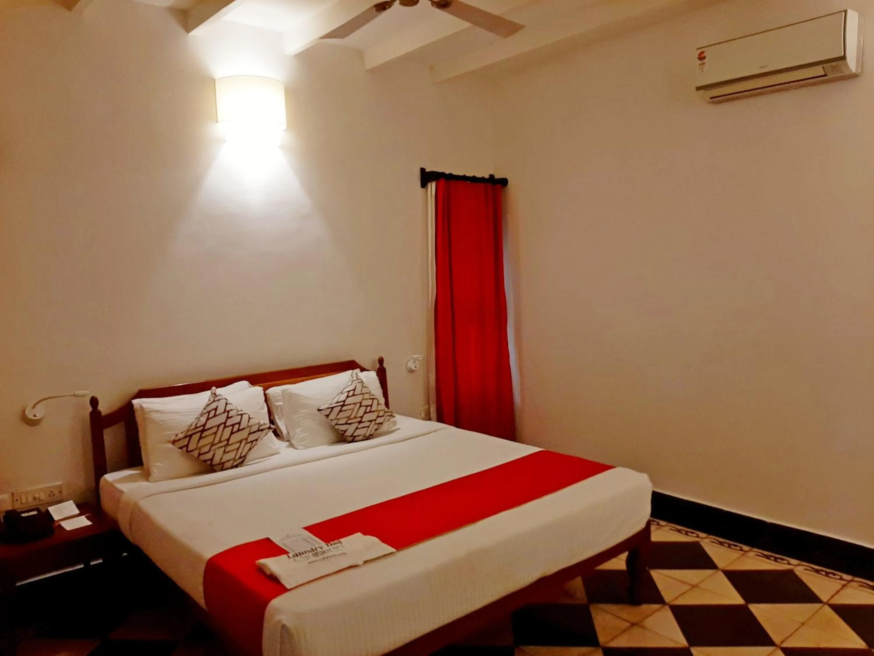 Bed in Mantra Koodam Kumbakonam - A CGH Earth Experience